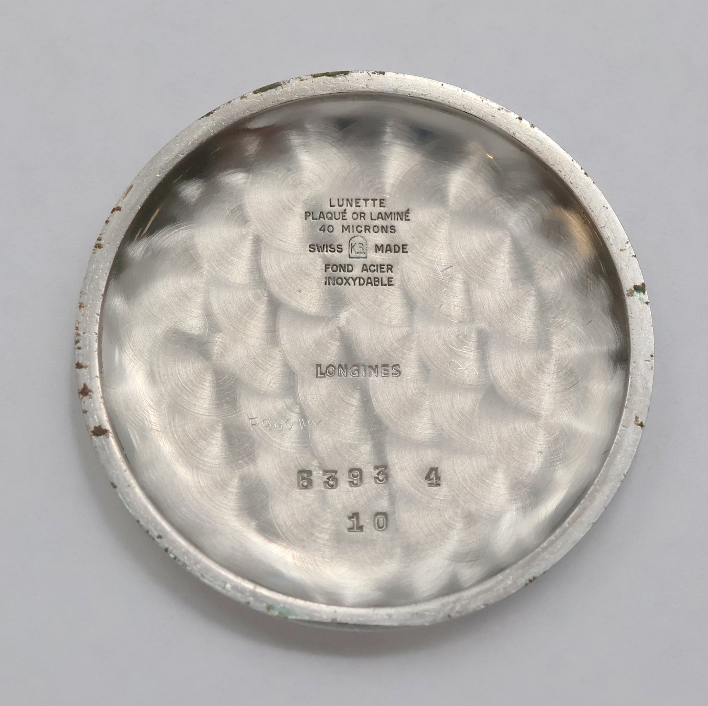 Detail g: Longines vergoldete Herrenarmbanduhr Referenz 6393, Schweiz um 1955, Handaufzug, 3-teil. Geh., Stahlboden aufgedr., versilb. Zifferbl. m. guill. ...