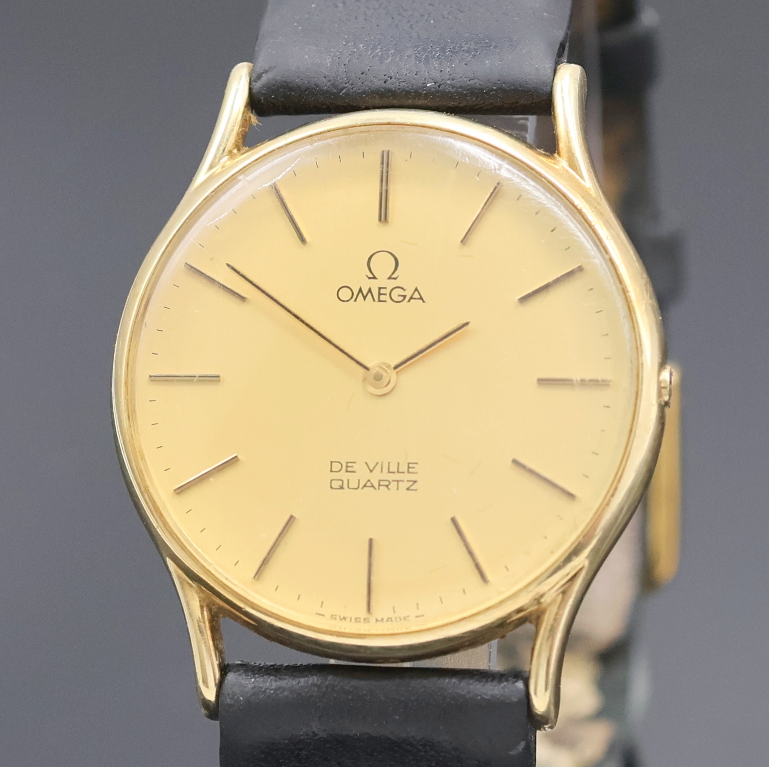Detail a: OMEGA Armbanduhr In GG 585/000 Referenz 191 0056 mit Box, Schweiz um 1980, quarz, 2- teil. Geh. m. aufgedr. Boden, gold. Zifferbl. m. gold. ...
