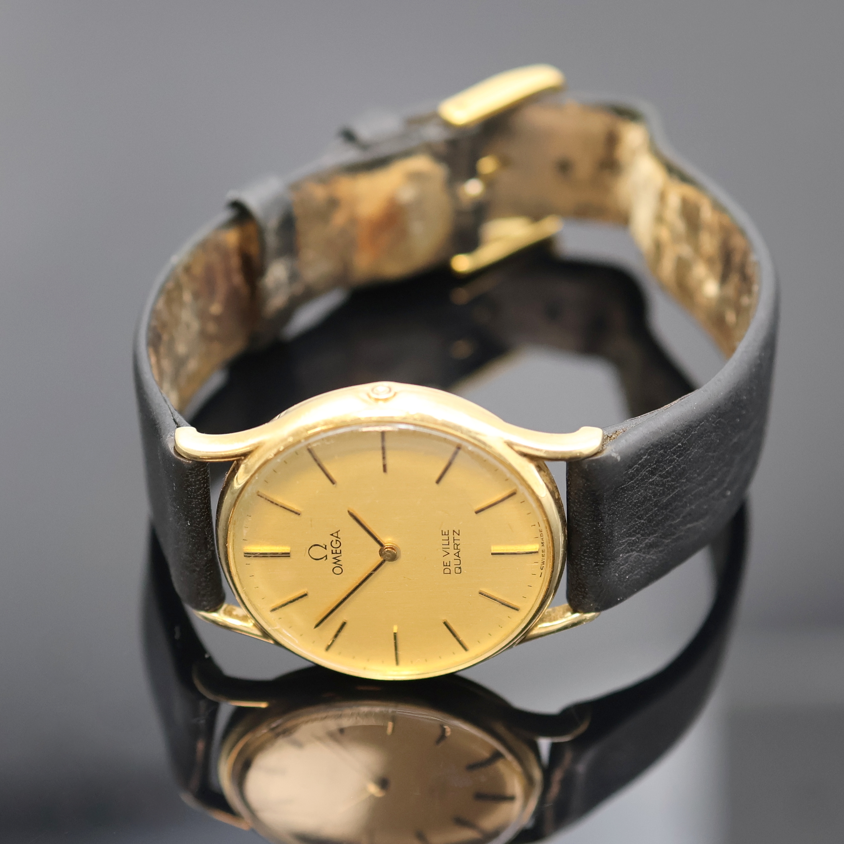 Detail c: OMEGA Armbanduhr In GG 585/000 Referenz 191 0056 mit Box, Schweiz um 1980, quarz, 2- teil. Geh. m. aufgedr. Boden, gold. Zifferbl. m. gold. ...