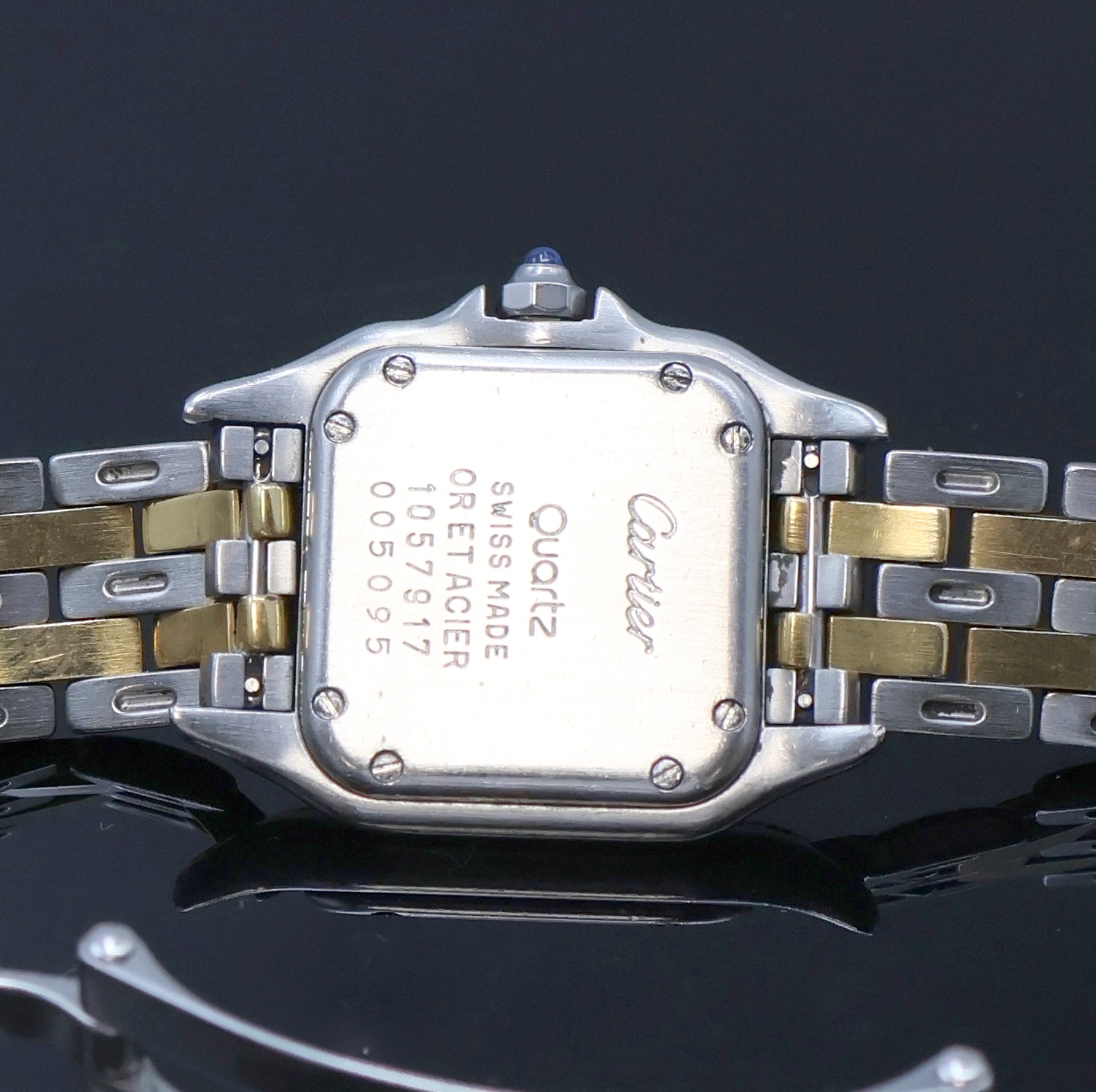 Detail d: CARTIER Panthere Damenarmbanduhr Referenz 1057917C, Schweiz um 1993, quarz, Boden 8- fach verschr., Schmuckkrone, Gliederband m. dopp. Faltschl., ...