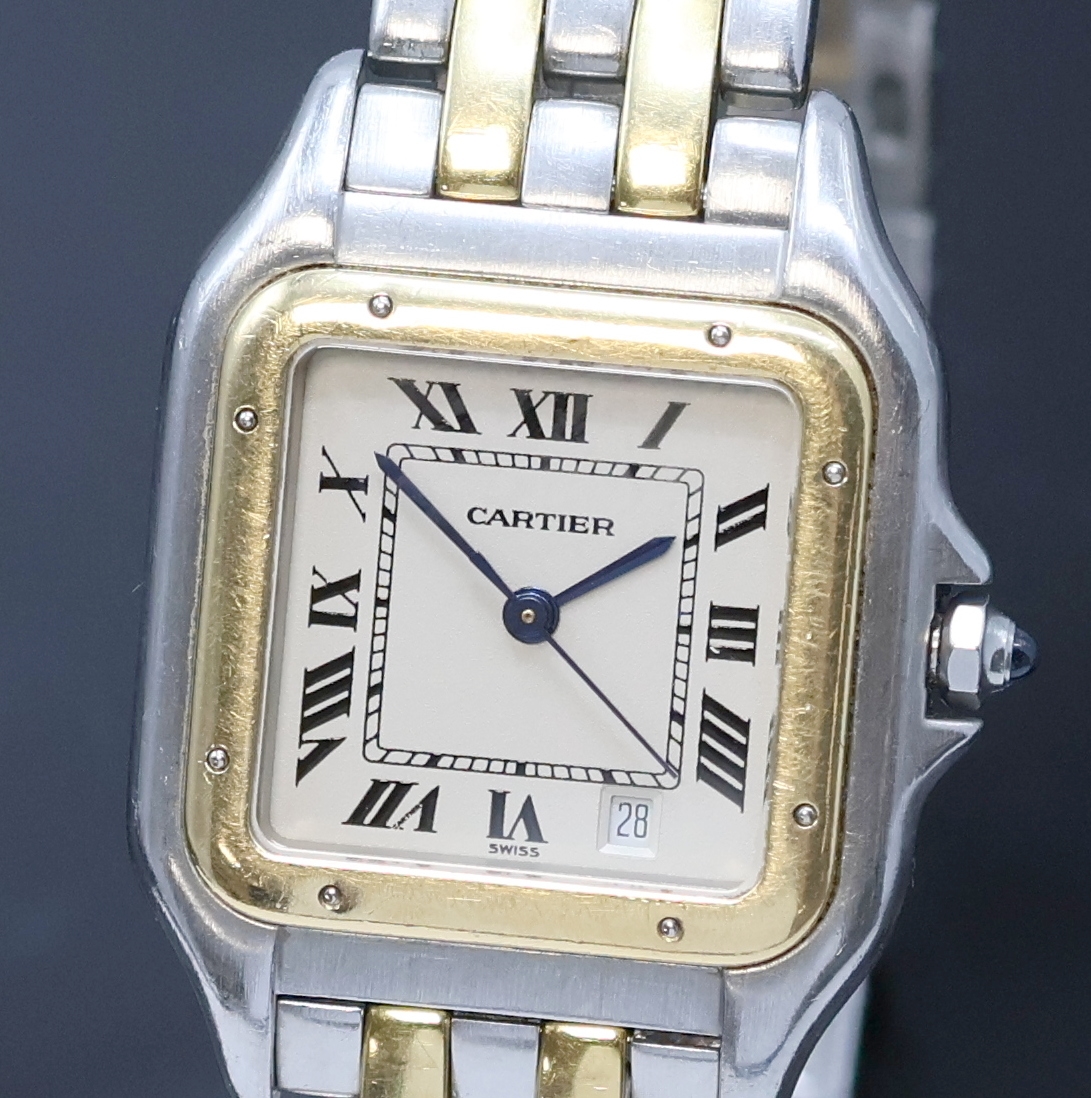Detail a: CARTIER Herrenarmbanduhr Panthere Referenz 183949, Schweiz um 1990, quarz, Edelstahl/Gold komb. inklusive Gliederband m. dopp. Faltschl., Boden ...