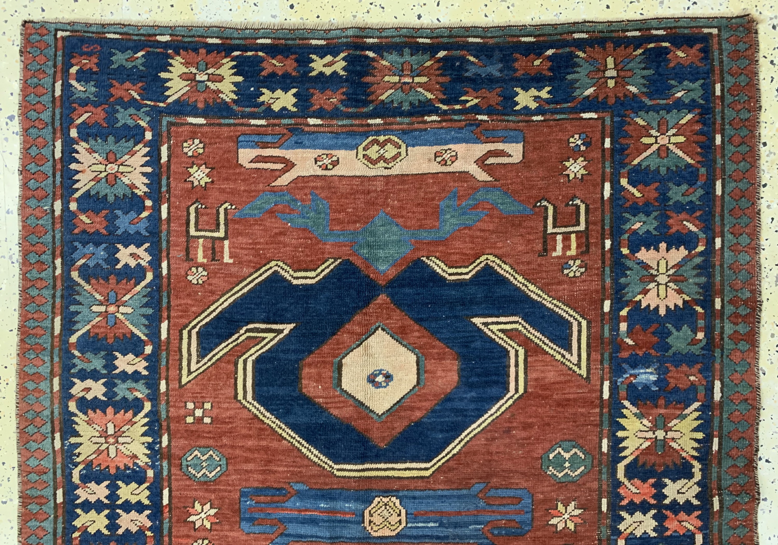 Detail a: Antiker Kazak, Kaukasus, Mitte 19.Jhd, Wolle auf Wolle, ca. 252 x 130 cm, EHZ: 3, (Restaurierungen)