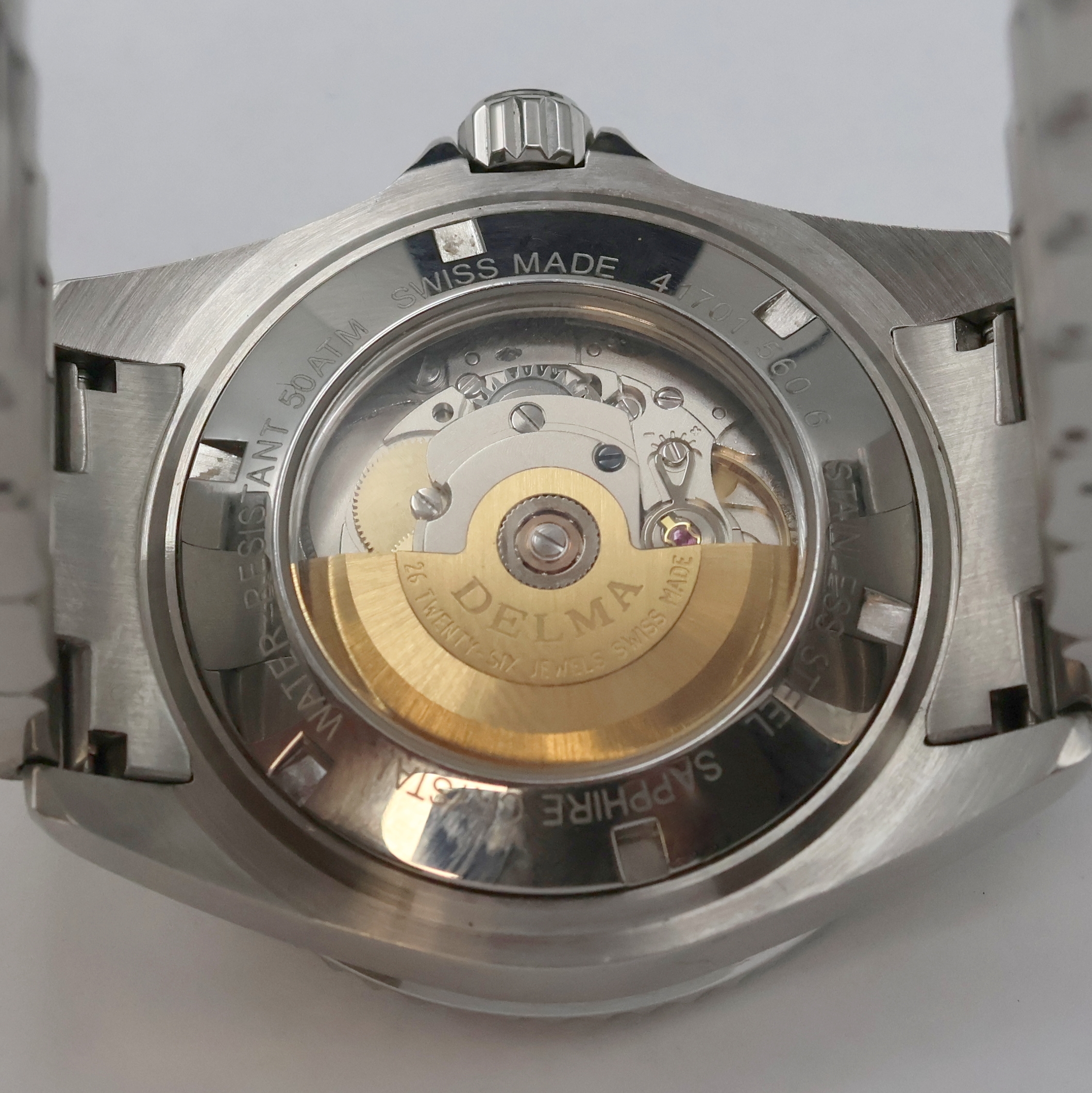Detail f: DELMA Santiago Herrenarmbanduhr Referenz 41701.560.6, Schweiz um 2010, Automatik, Edelstahlgeh. inkl. Gliederband m. Faltschl., beids. vergl., Boden ...