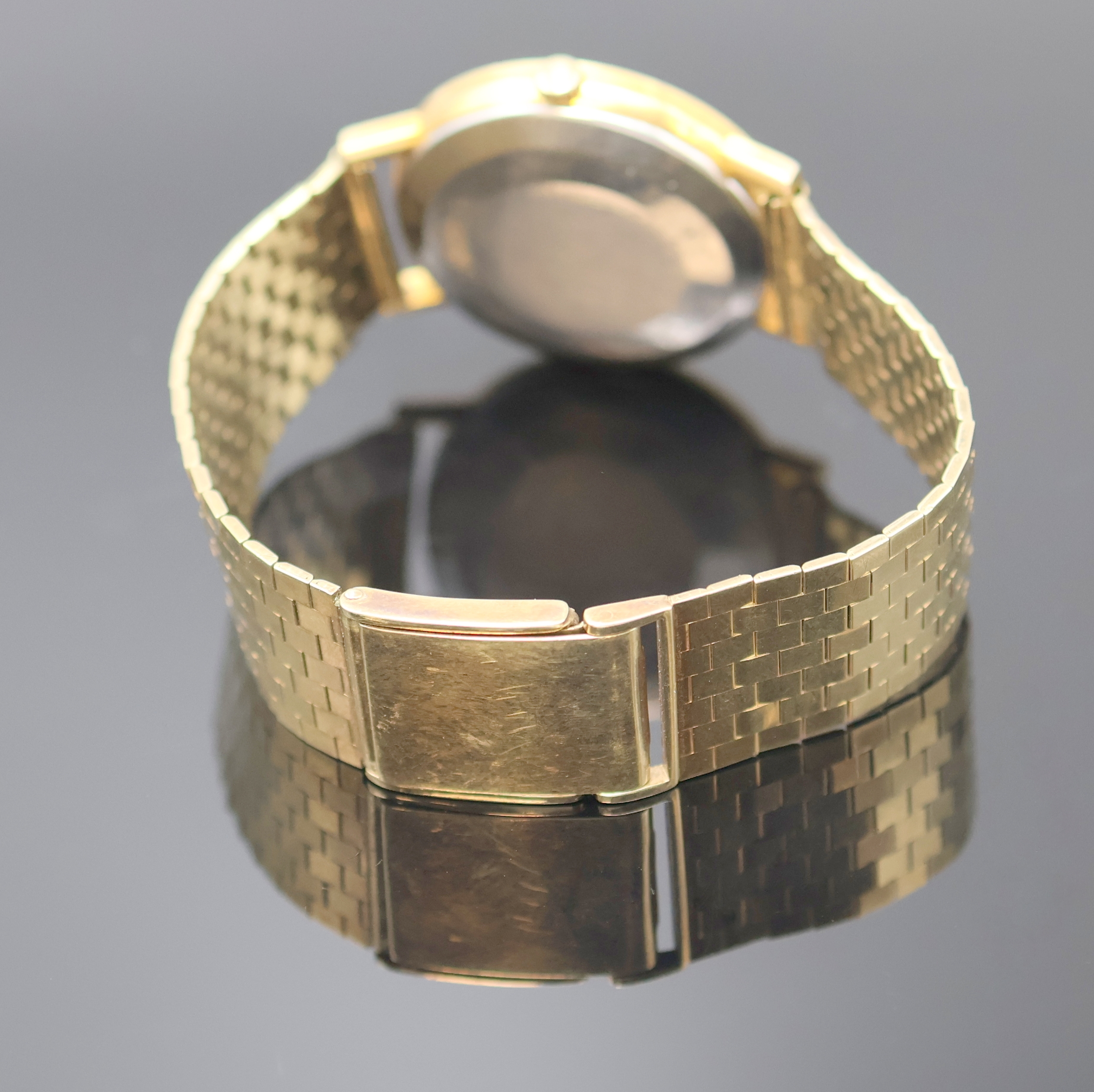 Detail d: Omega Geneve Armbanduhr Referenz 161.009 an GG 333/000 Band, Schweiz um 1968, Automatik, verg. 2-teil. Geh., Edelstahlboden aufgedr., orig. Krone, ...