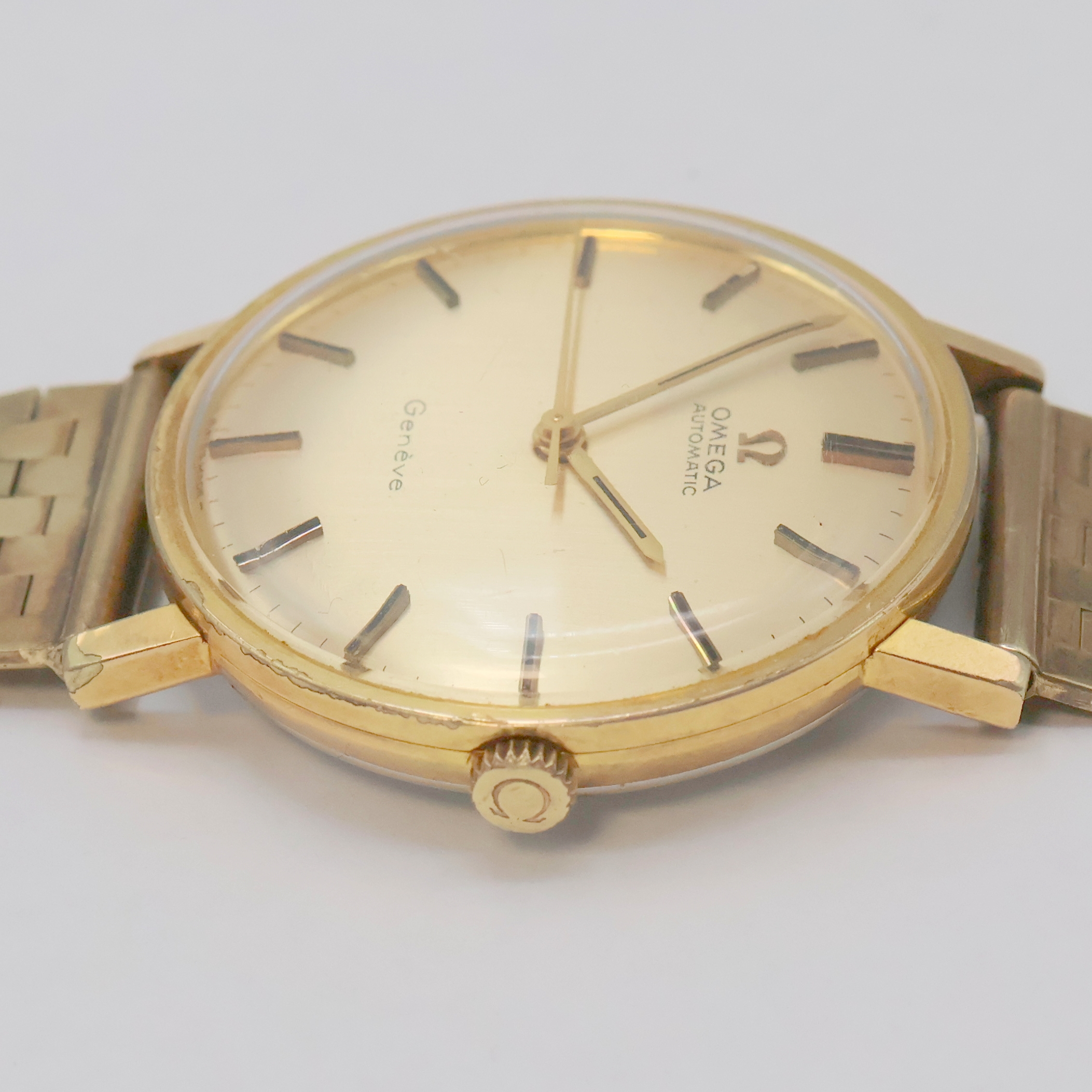 Detail f: Omega Geneve Armbanduhr Referenz 161.009 an GG 333/000 Band, Schweiz um 1968, Automatik, verg. 2-teil. Geh., Edelstahlboden aufgedr., orig. Krone, ...