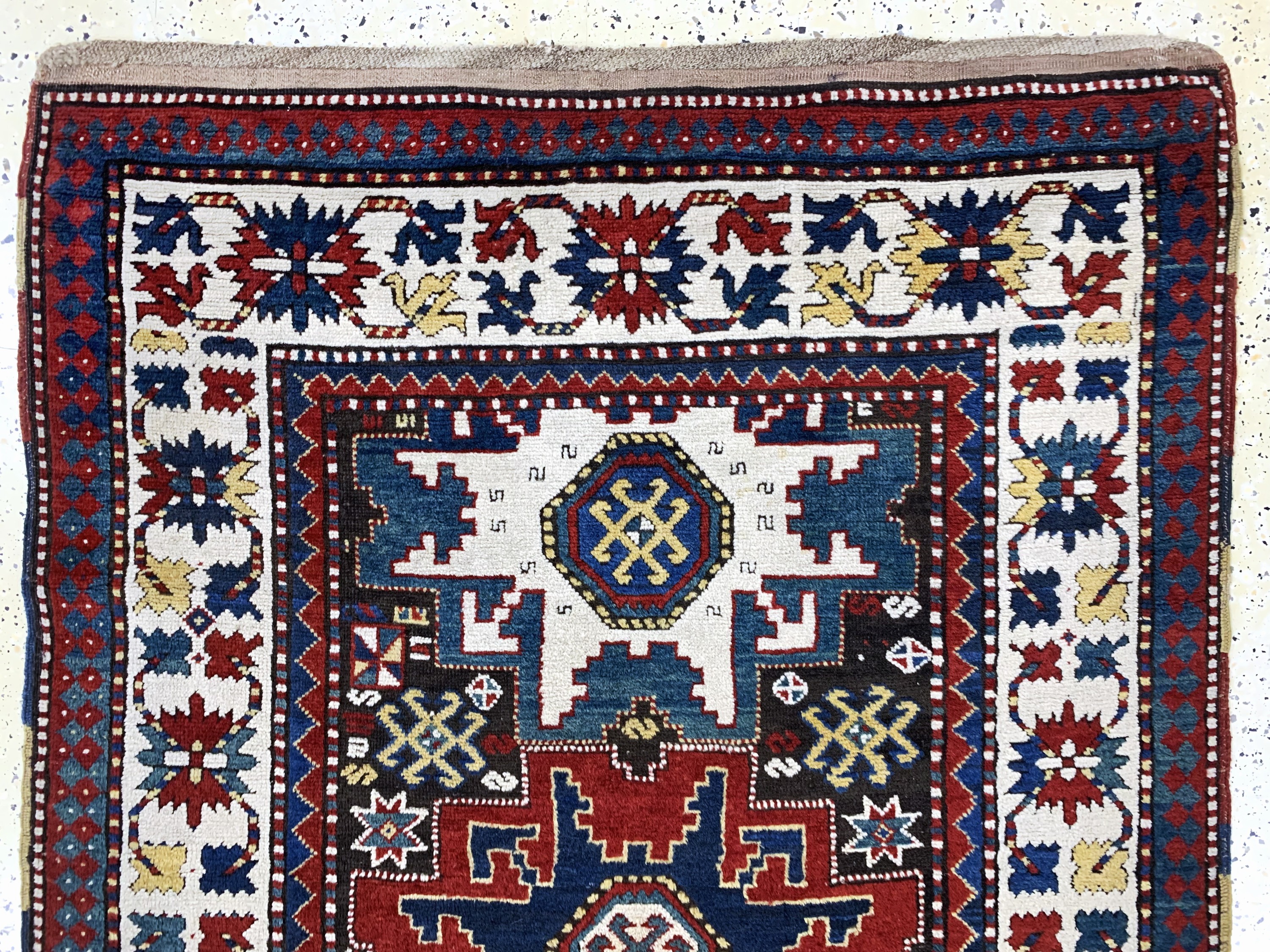 Detail a: Antiker Kazak, Kaukasus, 19.Jhd, Wolle auf Wolle, ca. 240 x 122 cm, EHZ: 2