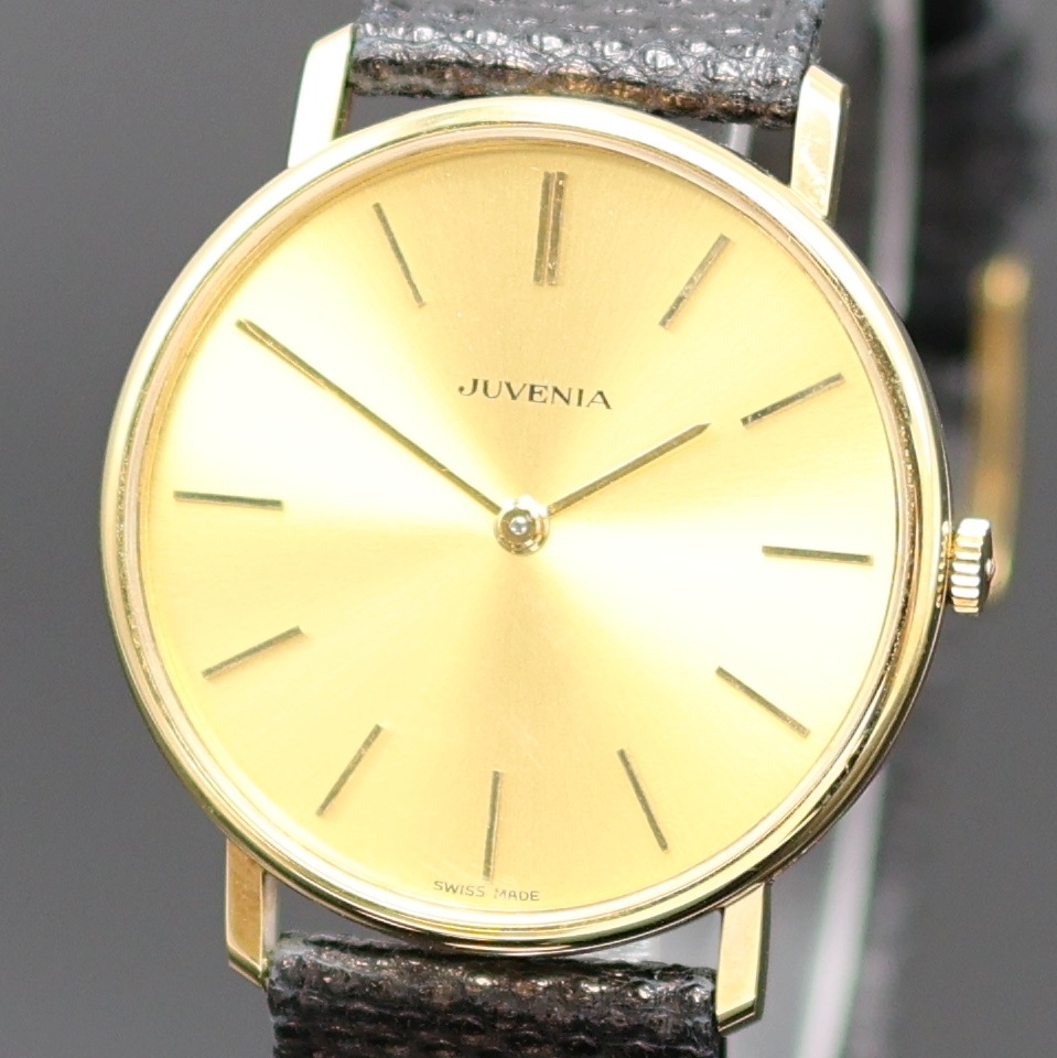 Detail a: JUVENIA nahezu neuwertige Armbanduhr, Handaufzug, Schweiz um 1980, verg. Geh. inkl. orig. Lederband m. orig. Dornschl., Glasrand und Edelstahlboden ...