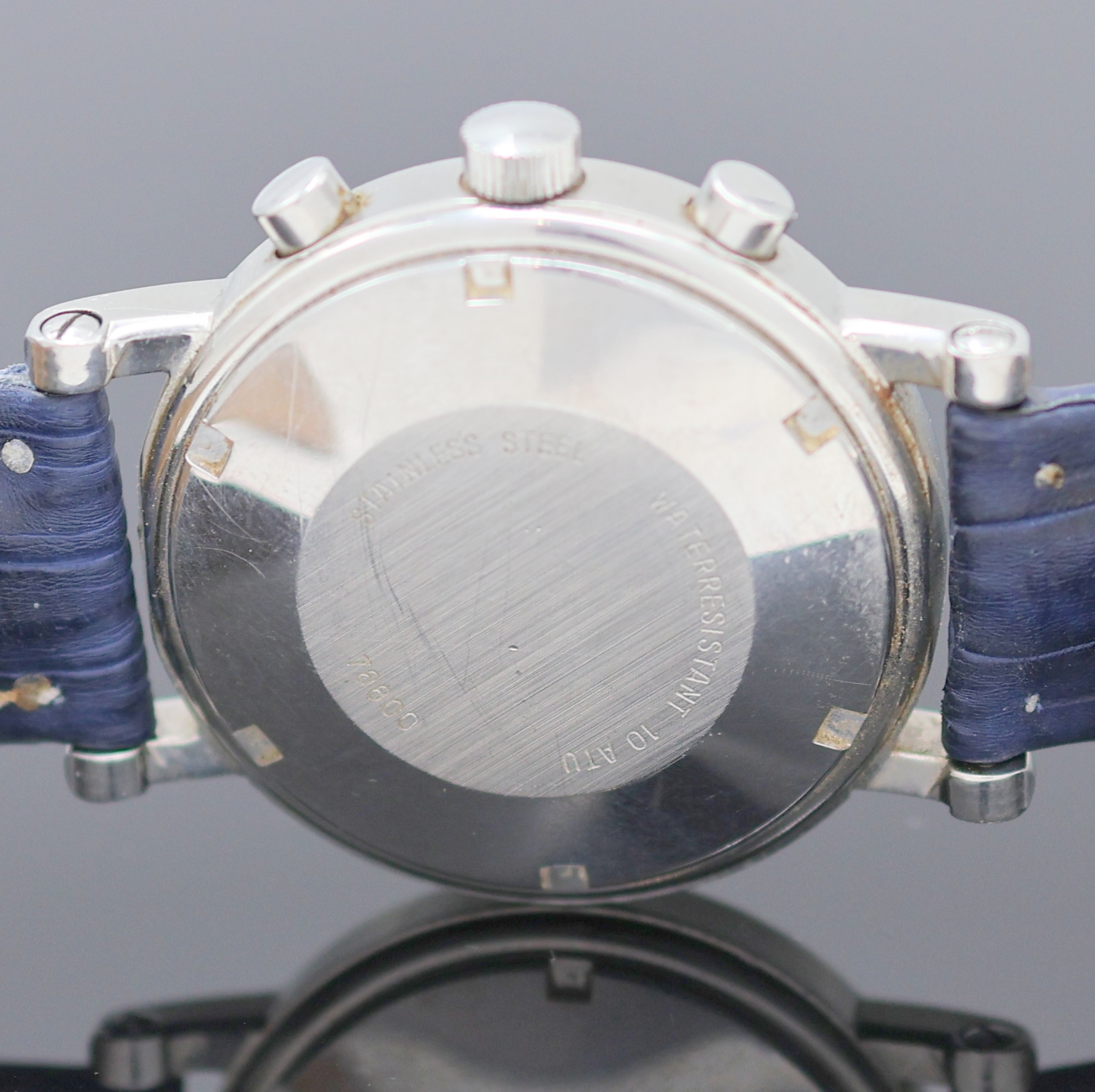 Detail f: CORTEBERT Armbandchronograph, Automatik, Schweiz um 1990, Edelstahlgeh., Boden verschr., blues, im Zentrum guill. Zifferbl. m. röm. Std., gold. ...