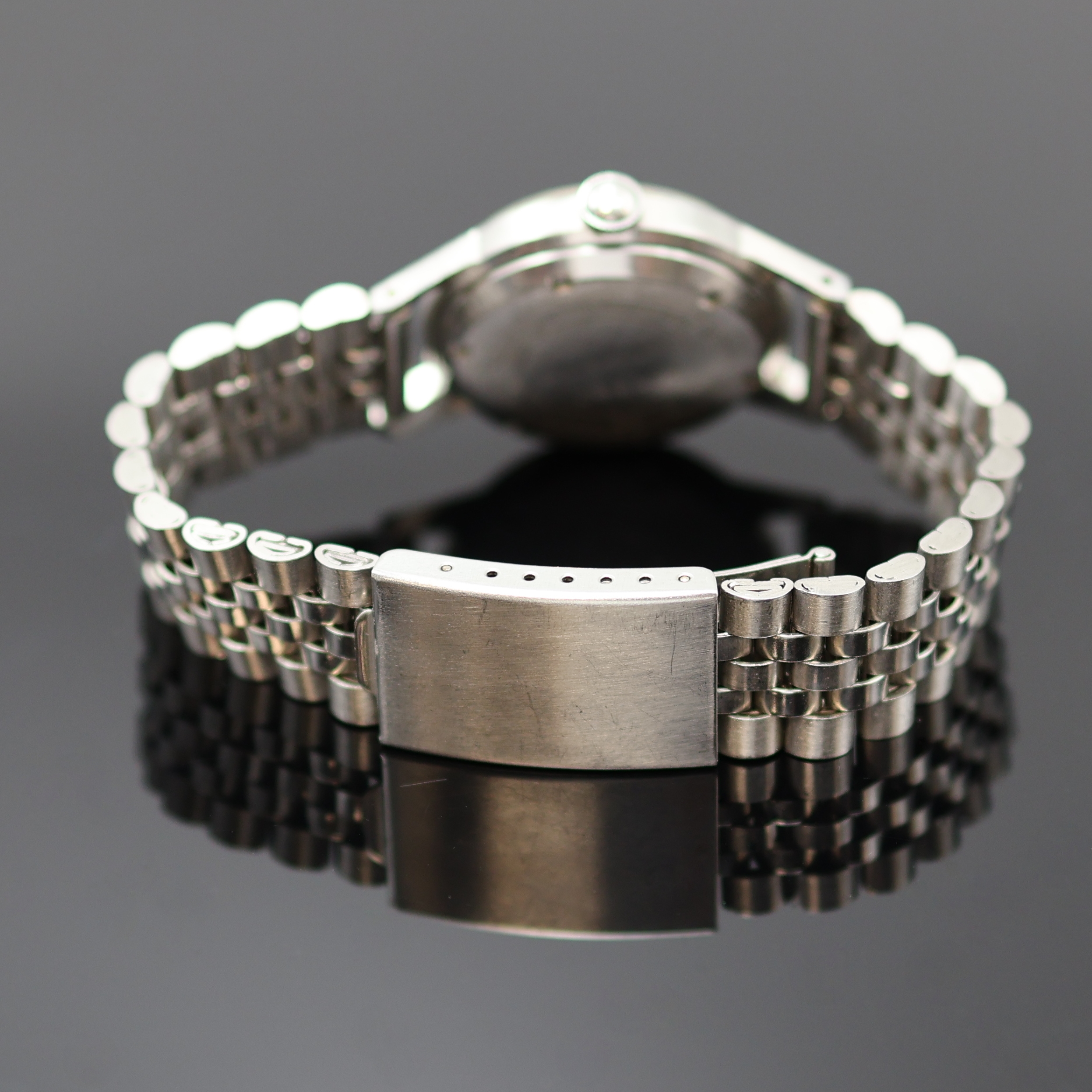 Detail c: PAUL BUHRE Armbanduhr RotoDatoR, Schweiz um 1957, Automatik, Edelstahlgeh. inkl. neutr. Gliederband, Boden verschr., vers. Zifferbl. m. aufges. ...
