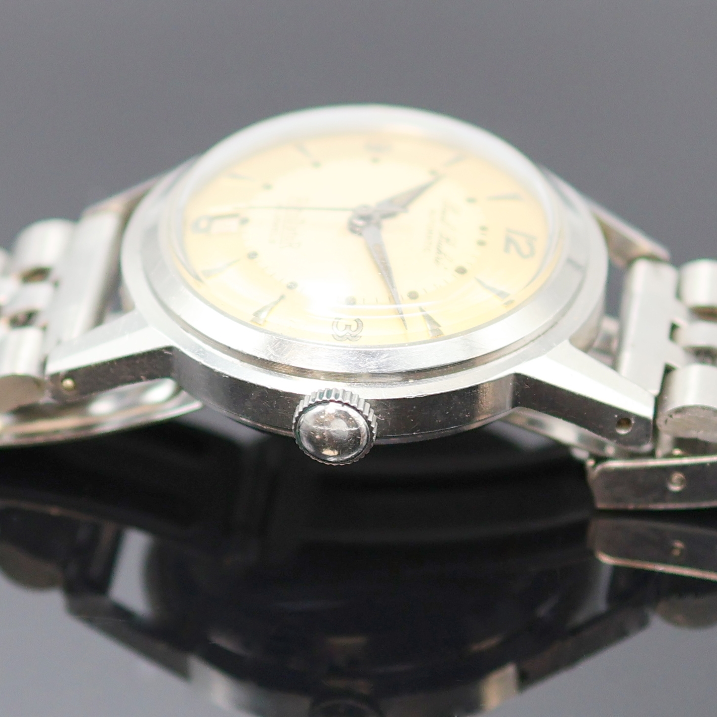 Detail d: PAUL BUHRE Armbanduhr RotoDatoR, Schweiz um 1957, Automatik, Edelstahlgeh. inkl. neutr. Gliederband, Boden verschr., vers. Zifferbl. m. aufges. ...
