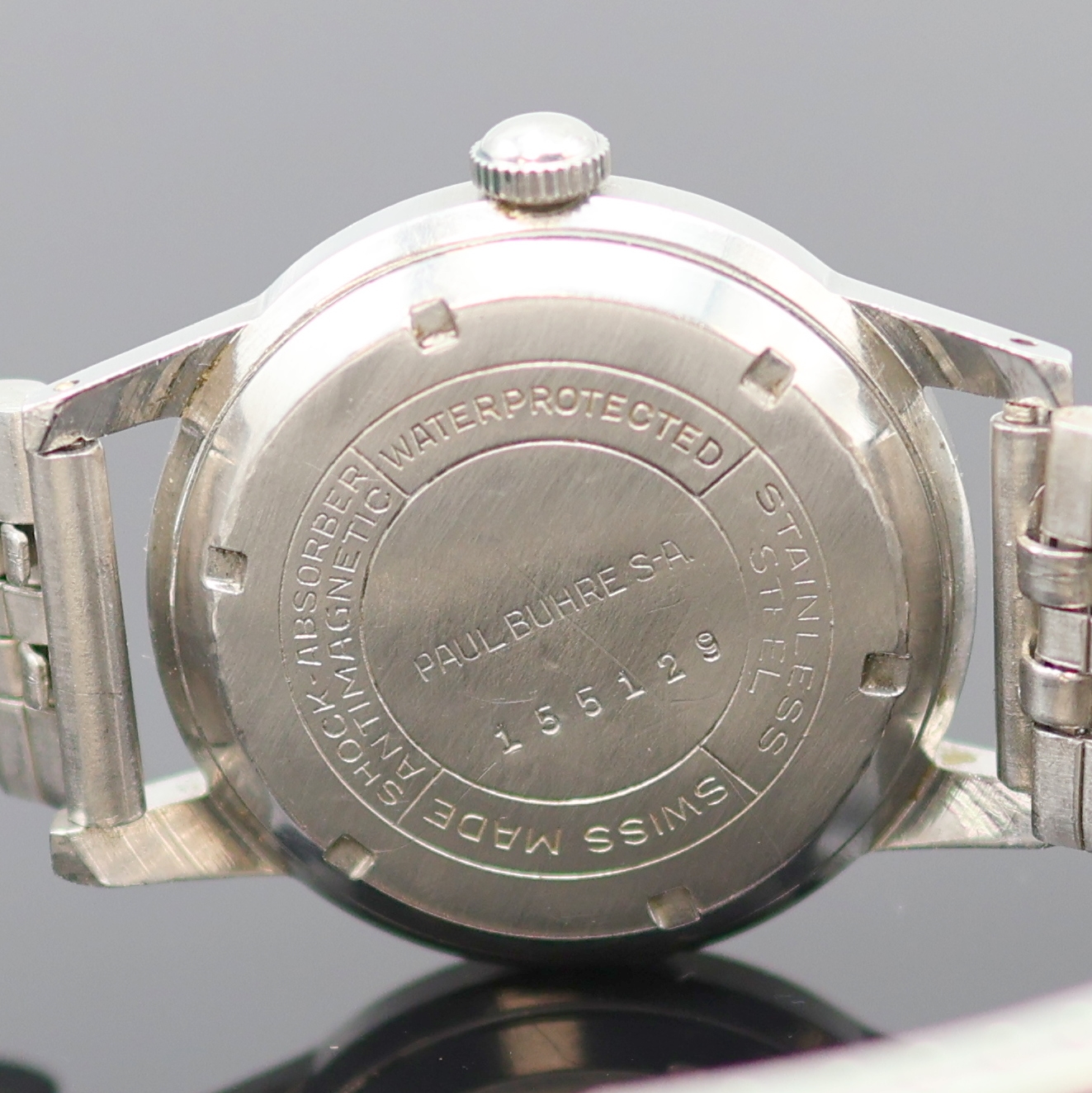 Detail f: PAUL BUHRE Armbanduhr RotoDatoR, Schweiz um 1957, Automatik, Edelstahlgeh. inkl. neutr. Gliederband, Boden verschr., vers. Zifferbl. m. aufges. ...