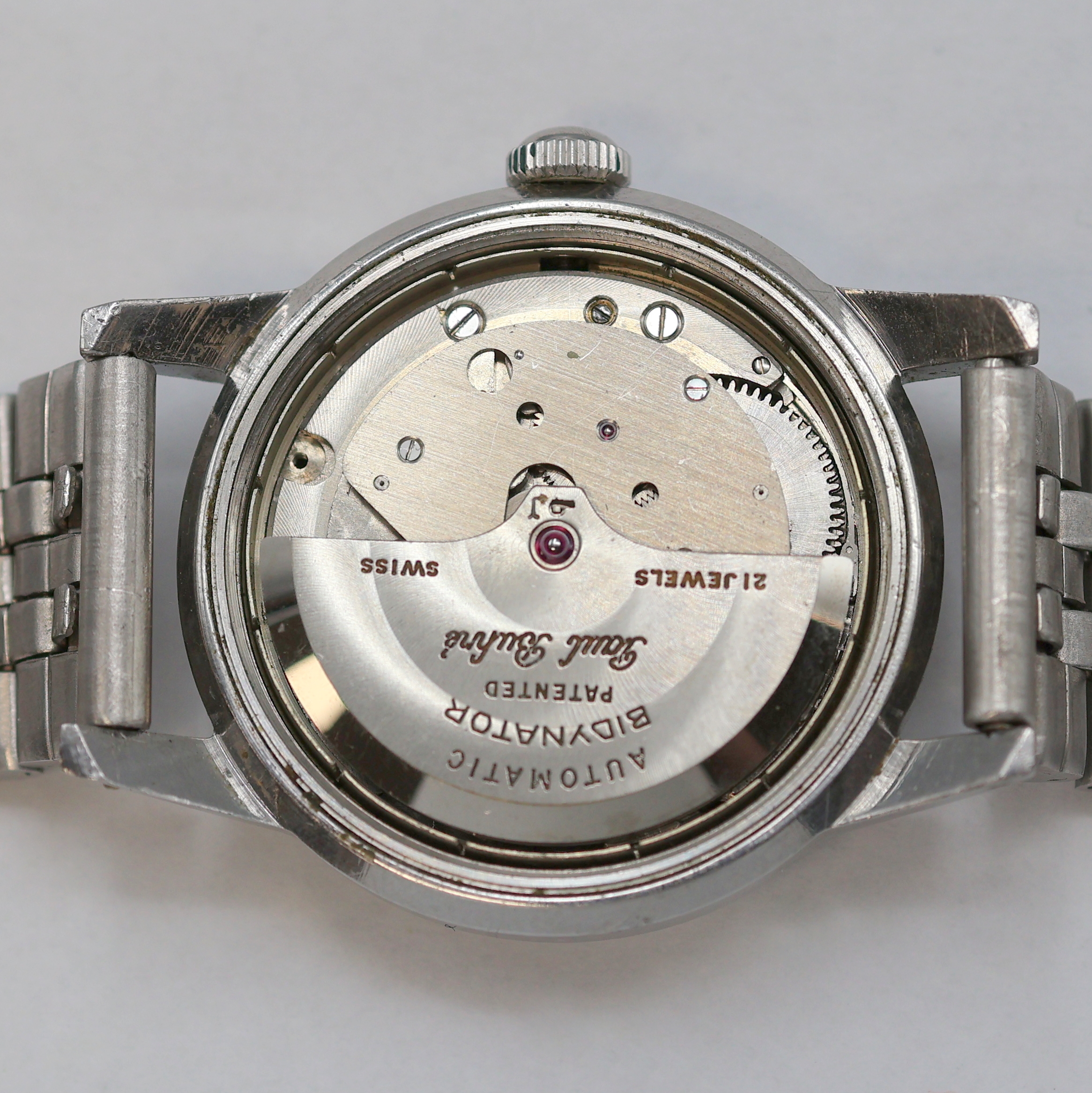 Detail g: PAUL BUHRE Armbanduhr RotoDatoR, Schweiz um 1957, Automatik, Edelstahlgeh. inkl. neutr. Gliederband, Boden verschr., vers. Zifferbl. m. aufges. ...