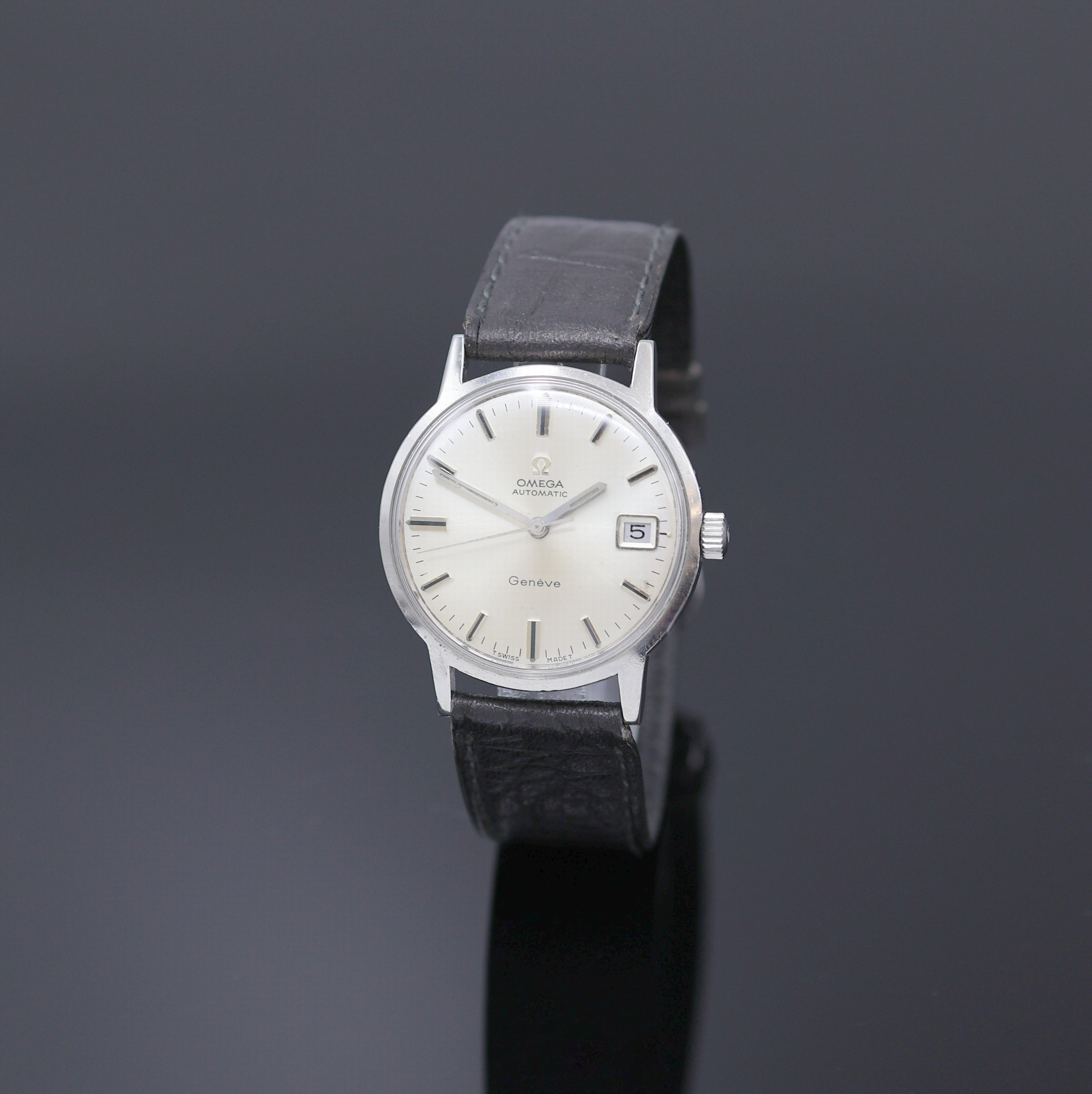 OMEGA Geneve Herrenarmbanduhr Referenz 166.070, Schweiz um 1969, Edelstahlgeh., Boden verschr., vers. Zifferbl. m. aufgel. Indizes l. fl., Datum bei ...