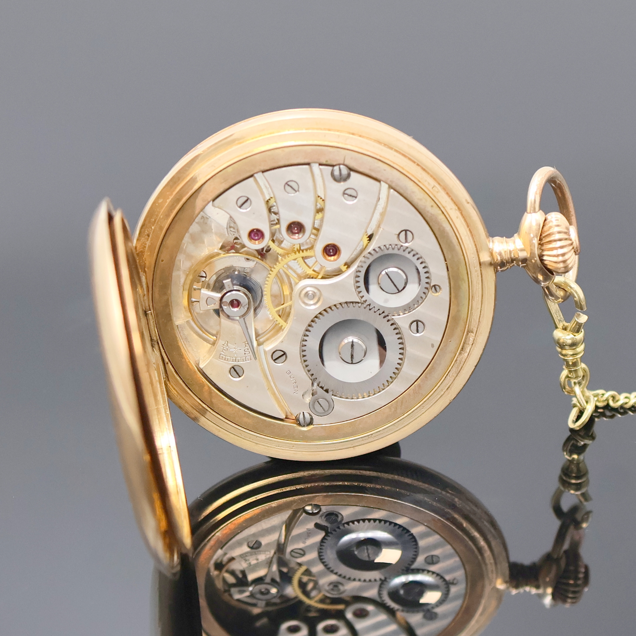 Detail f: BUREN Savonette Herrentaschenuhr in RG 585/000 an GG 333/000 Kette, Schweiz um 1920, glattes 3-Deckel Goldgeh. dell., gold. Metallzifferbl. m. arab. ...