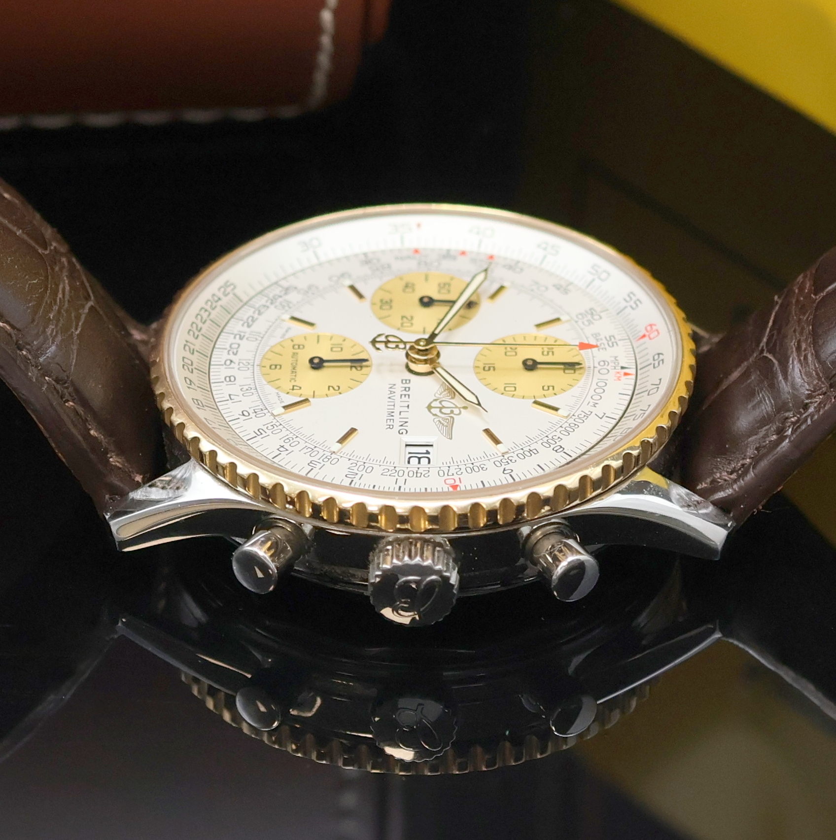 Detail b: BREITLING Armbandchronograph Old Navitimer Referenz D13022, Automatik, Schweiz um 1998, Edelstahlgeh. inkl. Lederband, Lünette in GG beids. drehb., ...
