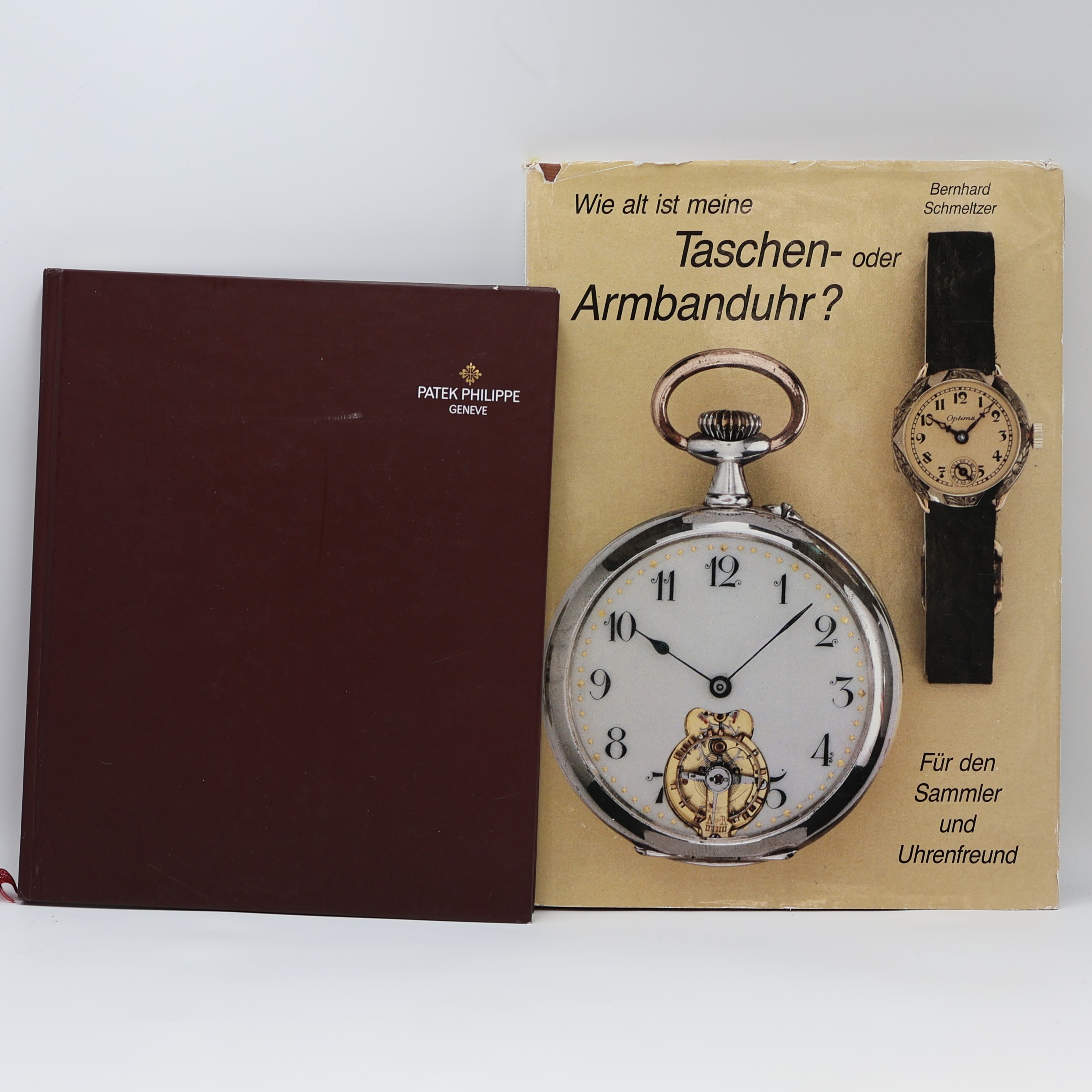 Detail a: Konvolut bestehend aus 8 Uhren-Etuis, 2 Büchern, 5 Uhrenständer sowie 1 Dupont Inlay, Etuis v. IWC, Chronoswiss, Longines, Tissot, Huber, Universal ...
