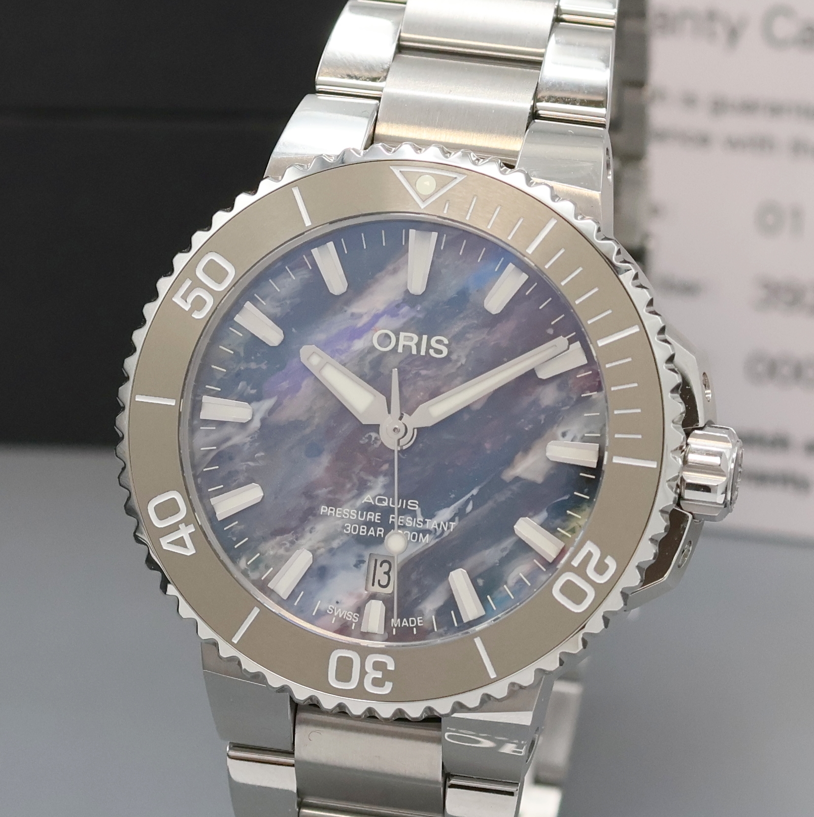Detail a: ORIS Aquis Herrenarmbanduhr in Stahl Referenz 7766A, Schweiz um 2015, Automatik, beids. vergl. Geh. in Edelstahl inkl. Gliederband m. Faltschl., ...