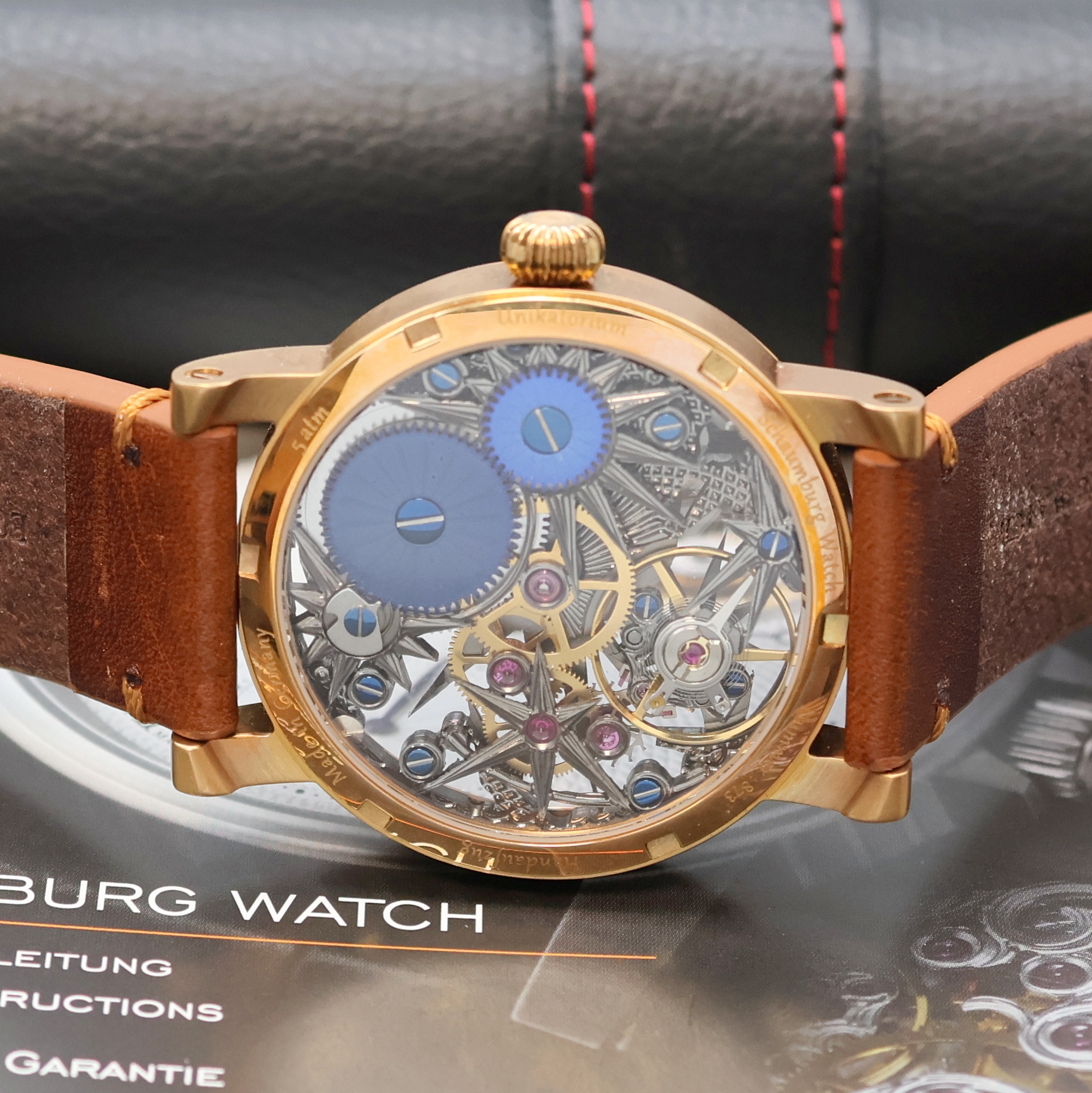 Detail c: SCHAUMBURG WATCH Armbanduhr Unikatorium, Handaufzug, verg. Geh. inkl. orig. Lederband m. orig. Dornschl., beids. vergl., Boden verschr., skel. ...