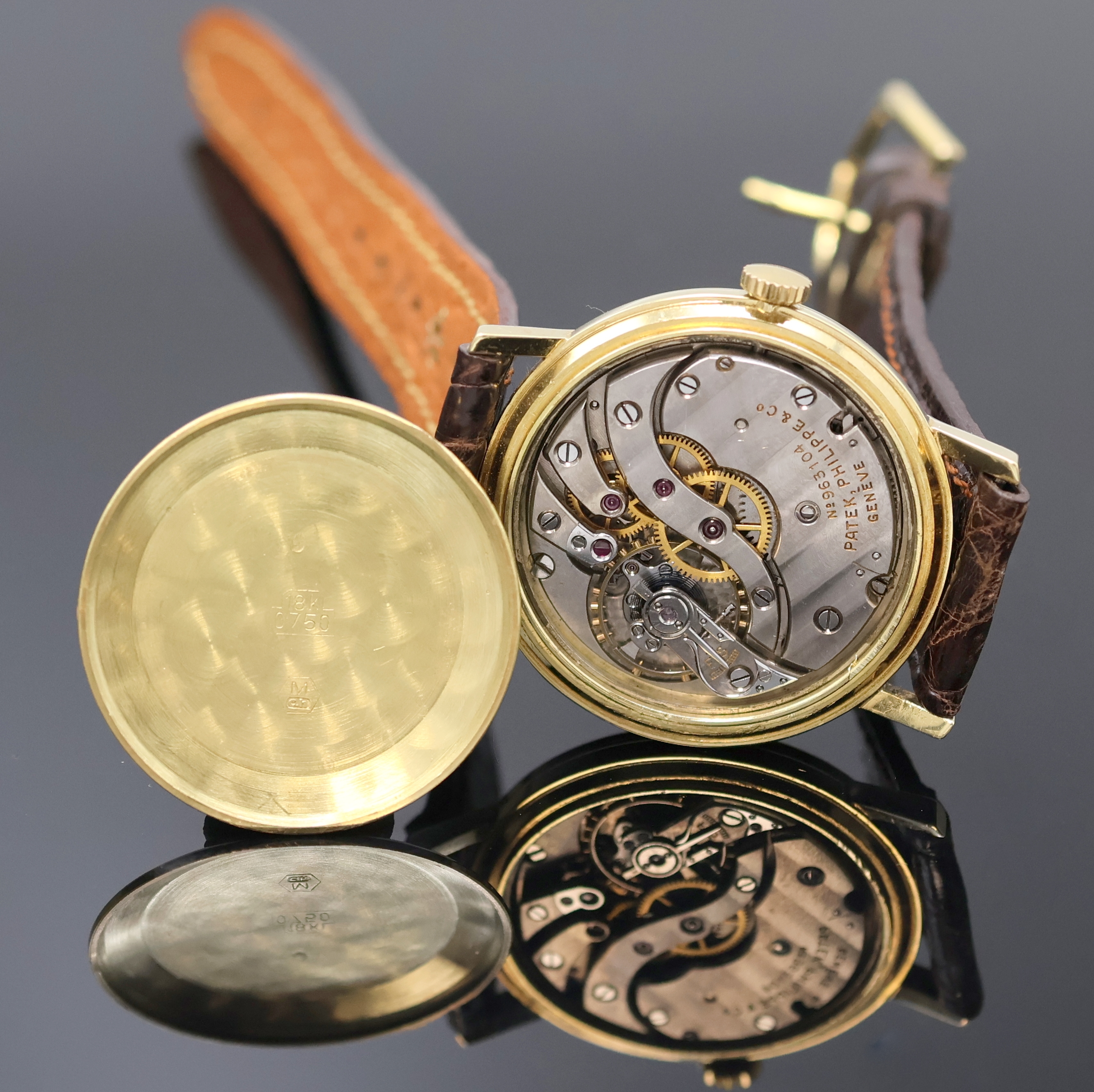 Detail d: PATEK PHILIPPE Serpico y Laino Armbanduhrwerk im neutralen GG 750/000 Gehäuse, Schweiz um 1950, Handaufzug, 3-tlg. Geh., Boden u. Glasrand aufgedr., ...