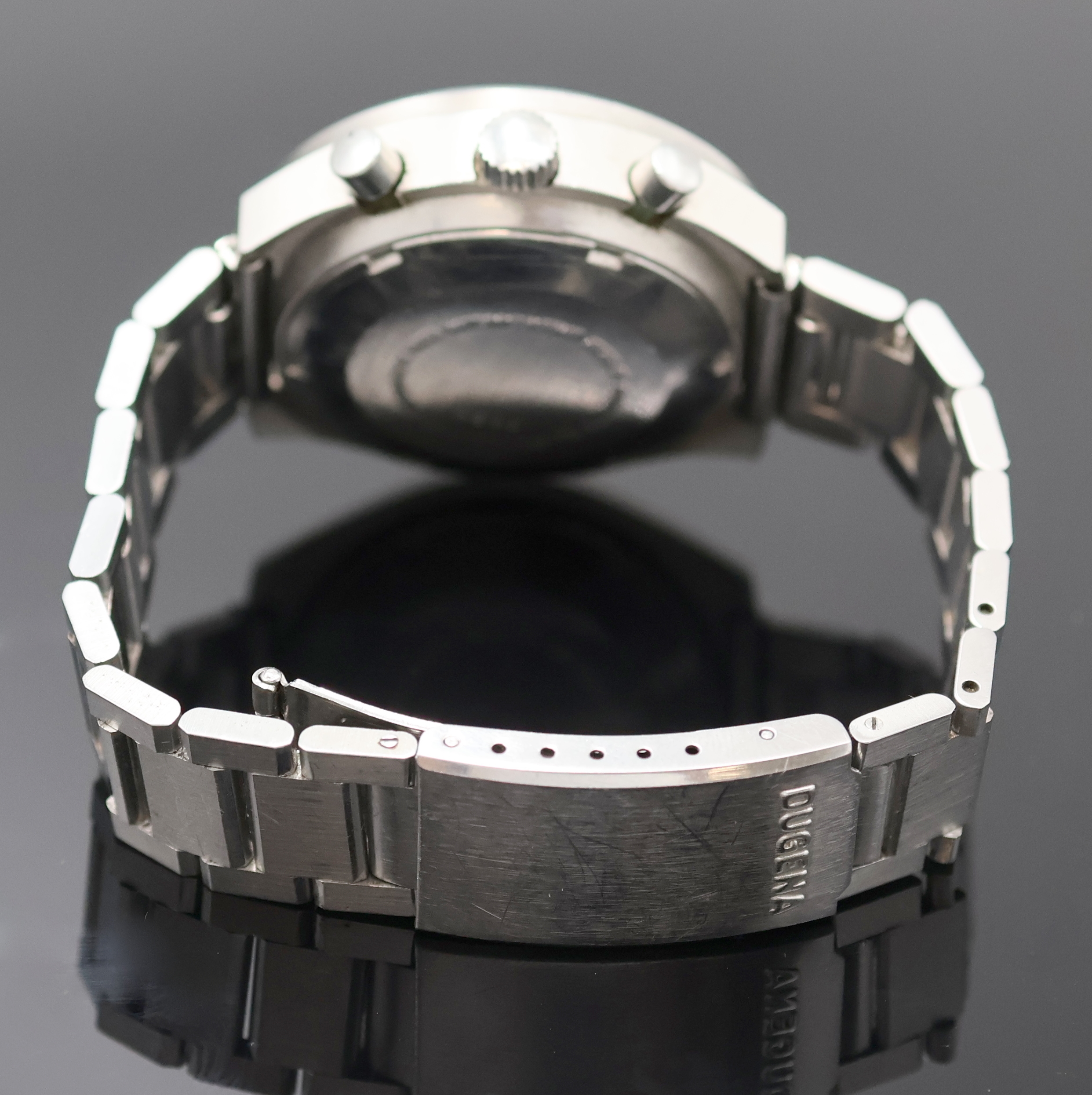Detail b: MEISTER-ANKER Armbandchronograph in Stahl, Schweiz um 1980, Automatik, Boden verschr., Dugena Stahlband, schwarzes Zifferbl., Leuchtindizes u. ...