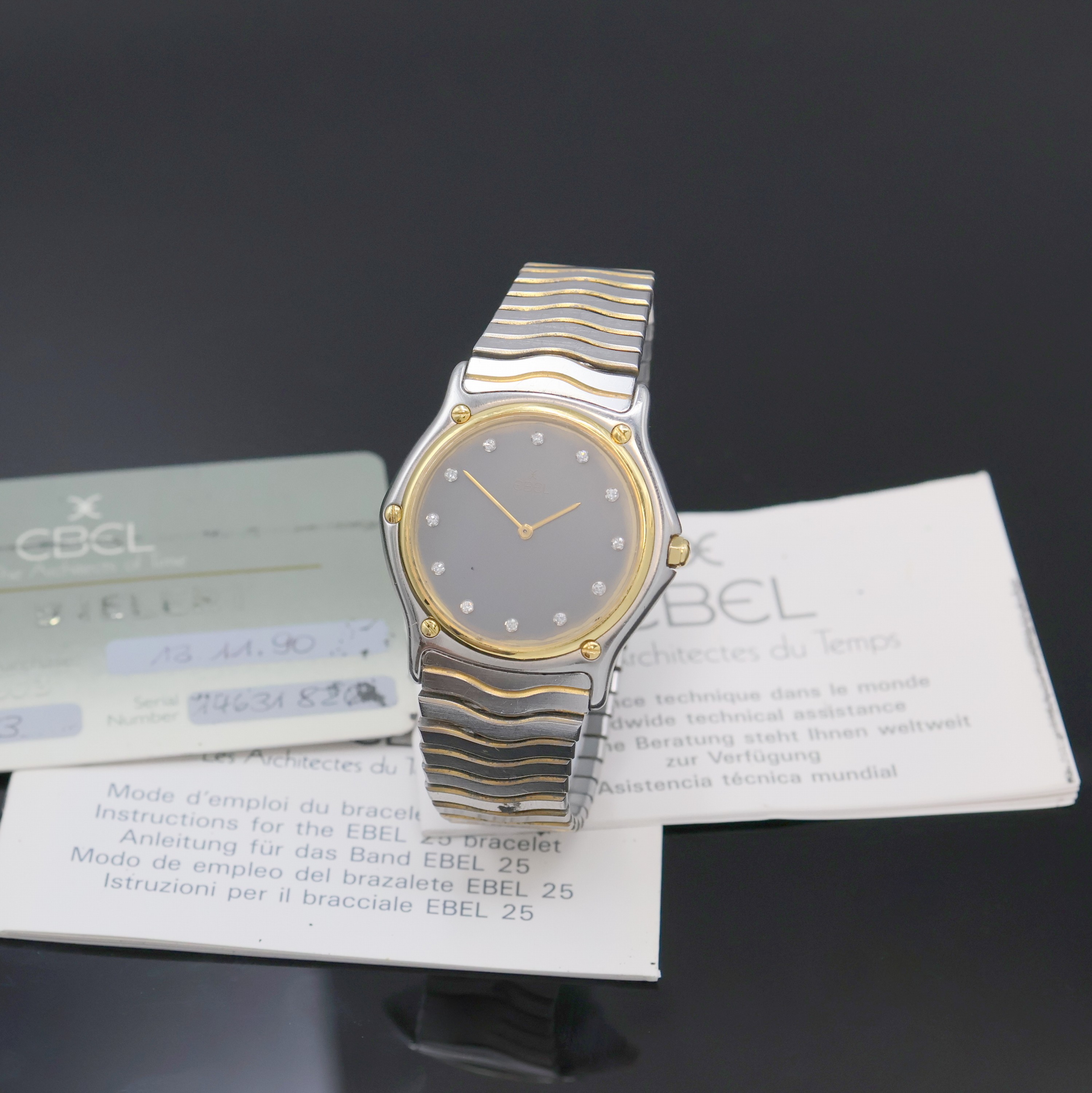 EBEL Armbanduhr in Stahl/Gold Referenz 181903, Schweiz verk. lt. Pap. 11/1990, quarz, 5-fach über Lünette verschr., orig. Wellengliederband m. ...