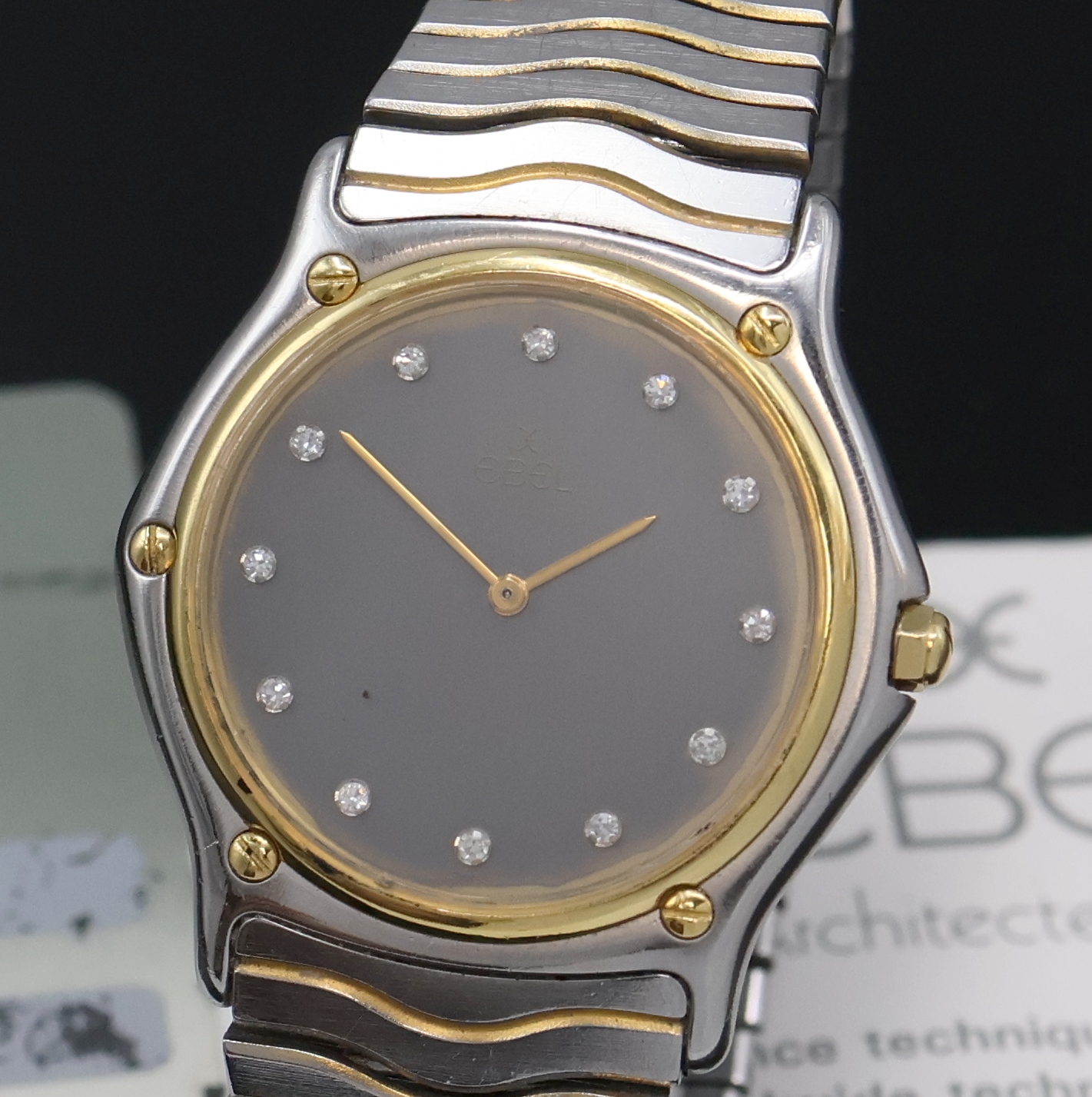 Detail a: EBEL Armbanduhr in Stahl/Gold Referenz 181903, Schweiz verk. lt. Pap. 11/1990, quarz, 5-fach über Lünette verschr., orig. Wellengliederband m. ...