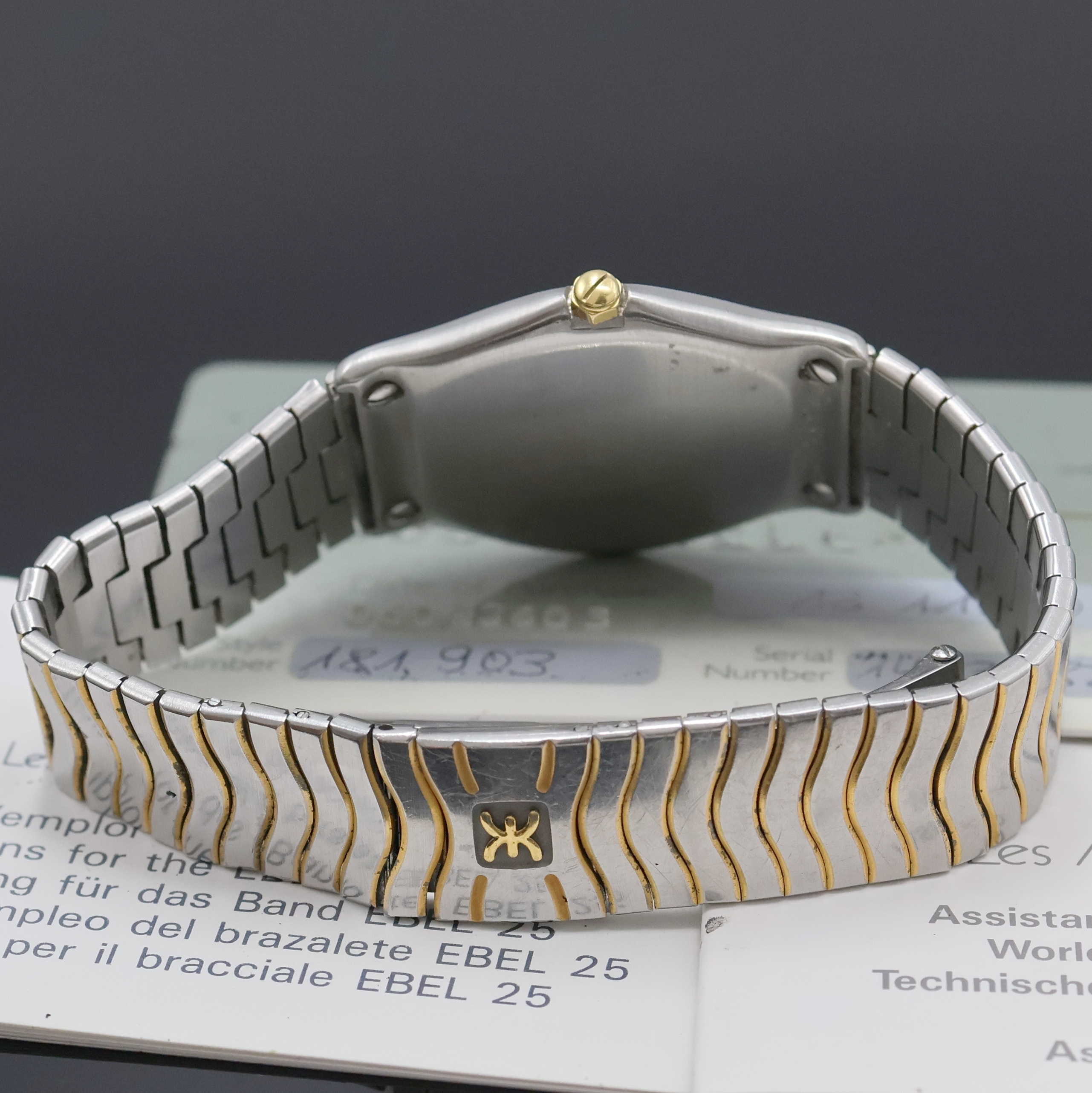 Detail b: EBEL Armbanduhr in Stahl/Gold Referenz 181903, Schweiz verk. lt. Pap. 11/1990, quarz, 5-fach über Lünette verschr., orig. Wellengliederband m. ...