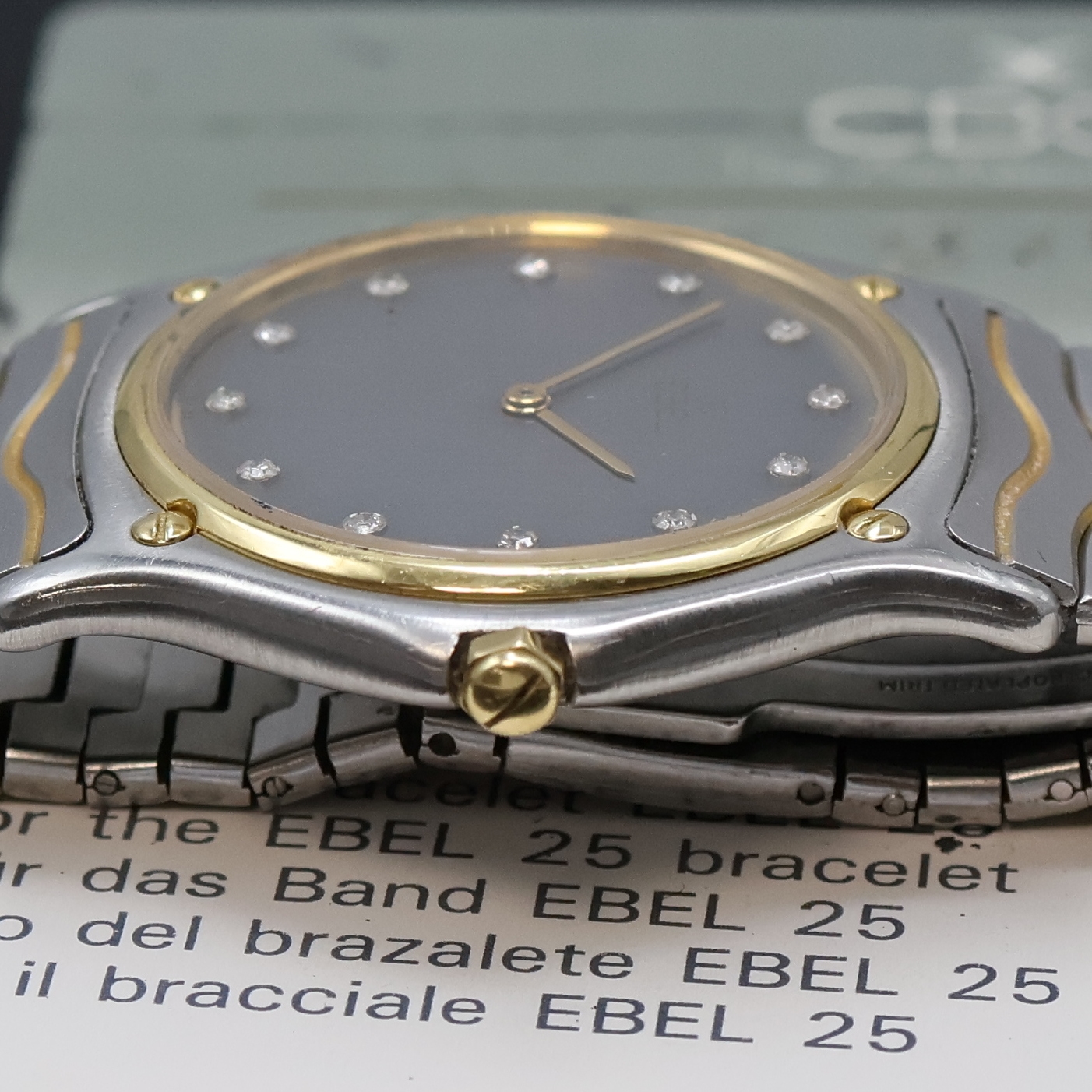 Detail c: EBEL Armbanduhr in Stahl/Gold Referenz 181903, Schweiz verk. lt. Pap. 11/1990, quarz, 5-fach über Lünette verschr., orig. Wellengliederband m. ...