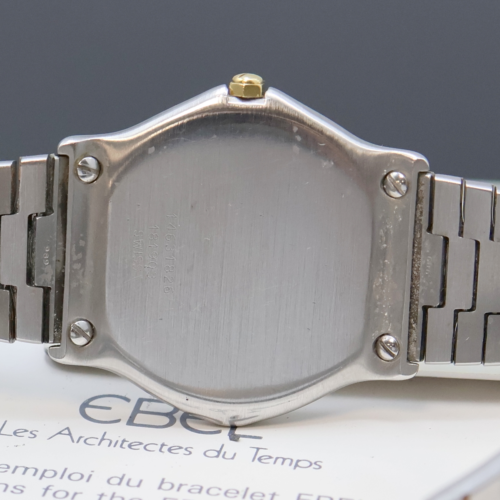 Detail d: EBEL Armbanduhr in Stahl/Gold Referenz 181903, Schweiz verk. lt. Pap. 11/1990, quarz, 5-fach über Lünette verschr., orig. Wellengliederband m. ...