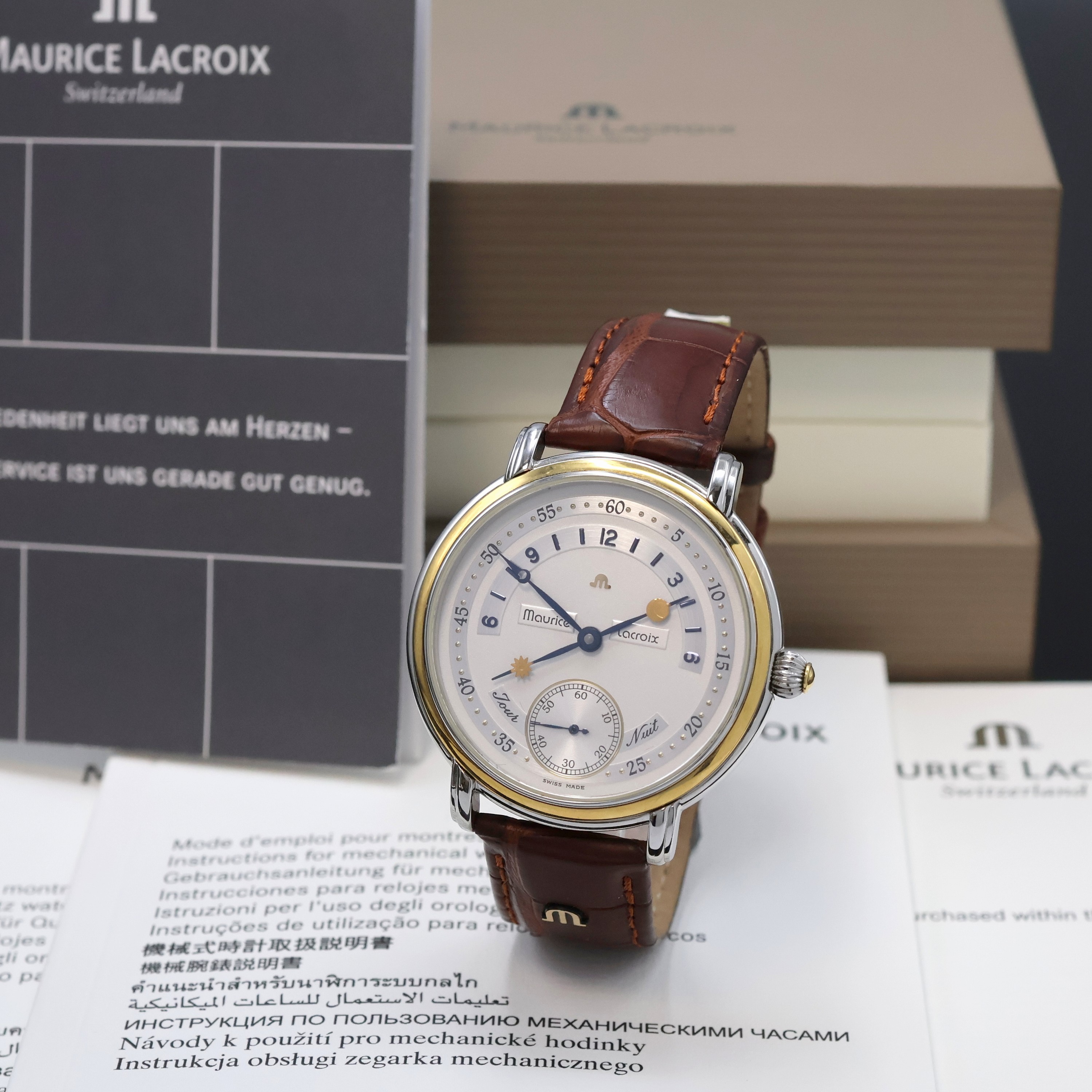 MAURICE LACROIX Herrenarmbanduhr Jour et Nuit Referenz 07769, Handaufzug, beids. vergl. Edelstahlgeh., Boden aufgedr., Maurice Lacroix Lederband m. ...