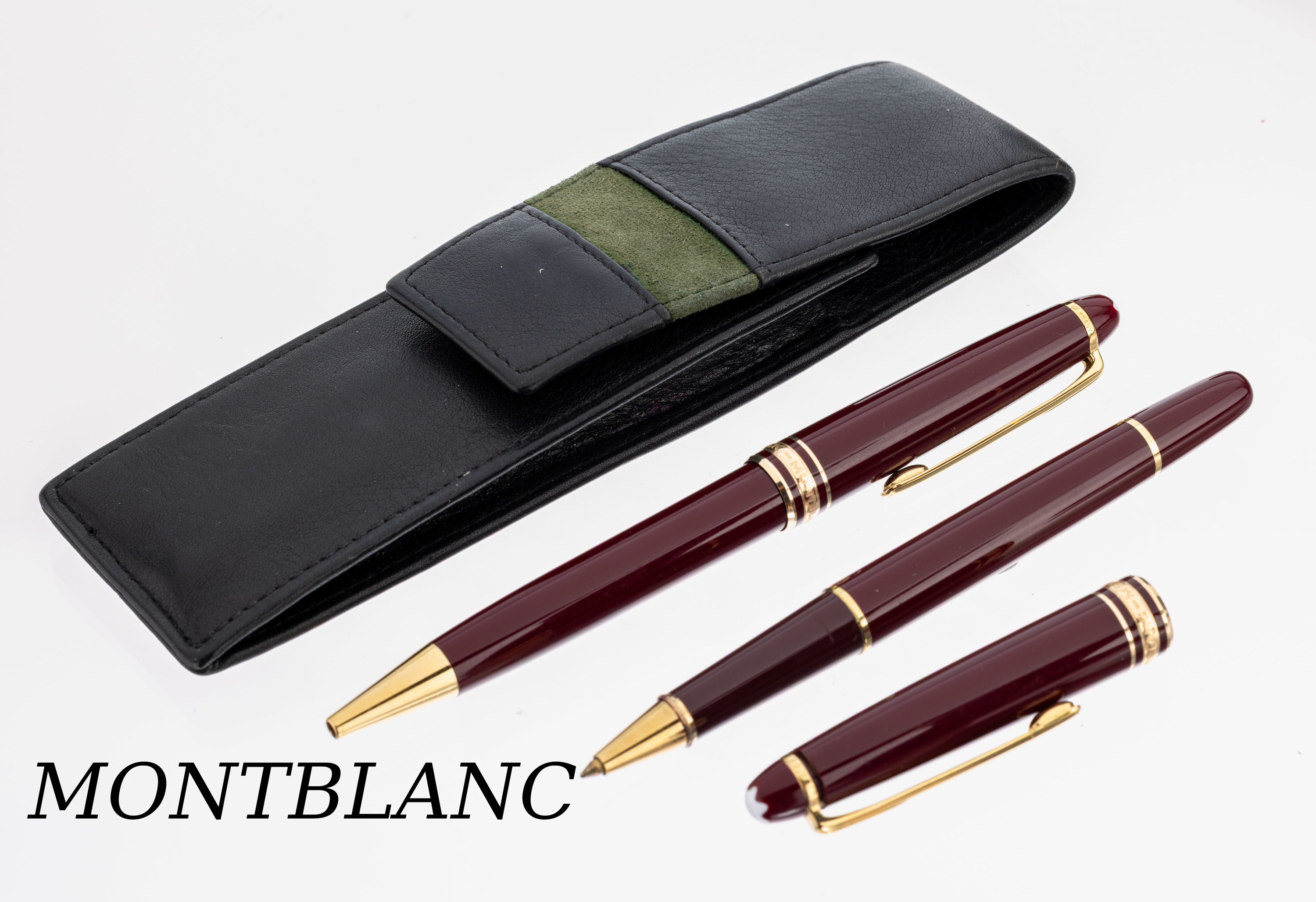 MONTBLANC Set, Meisterstückserie, 2 Kugelschreiber, Korpus roter Edelharz, Monturen Metall verg., mit Lederetui (nicht orig.)
