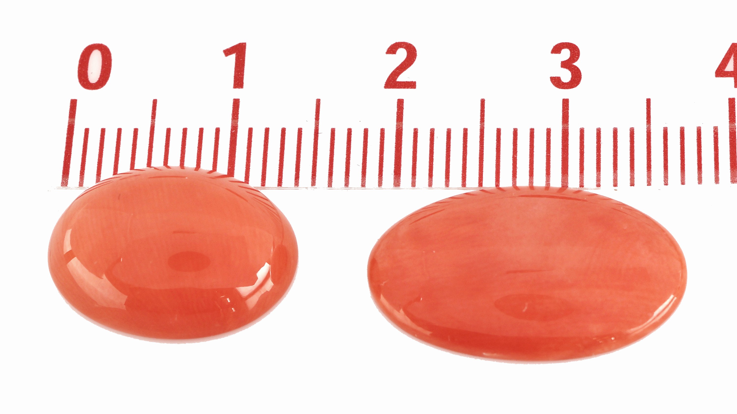 Detail b: Lot 4 lose Korallen-Cabochons, zus. ca. 23.82 ct, ovale, Versand nur innerhalb der EU