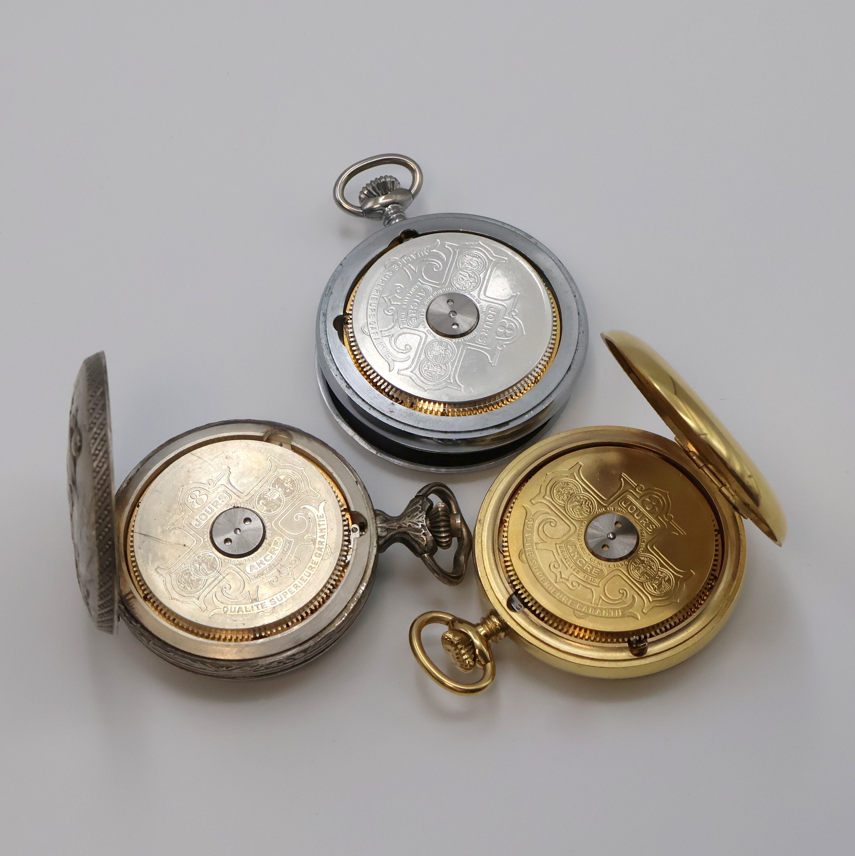 Detail c: HEBDOMAS 3 Taschenuhren mit 8-Tage-Werken, Schweiz um 1980, 2 x offene Geh. dell. in verg. u. verchr., 1 x versilb. Savonette Relief-Geh. ...