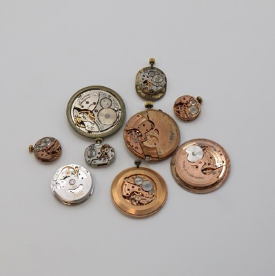 Image 26975394 - PIAGET, ROLEX, IWC, OMEGA, GIRARD PERREGAUX 9 Armbanduhrwerke, Schweiz um 1950-2000, ...