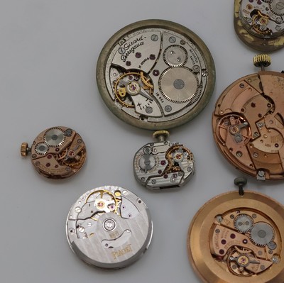 26975394b - PIAGET, ROLEX, IWC, OMEGA, GIRARD PERREGAUX 9 Armbanduhrwerke, Schweiz um 1950-2000, ...