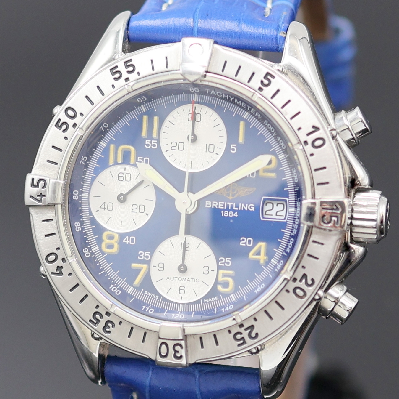 Detail a: BREITLING Armbandchronograph Referenz A13035.1, Schweiz um 1995, Automatik, verschr. Edelstahlgeh., verschr. Krone, eins. drehb. Lünette, blaues ...