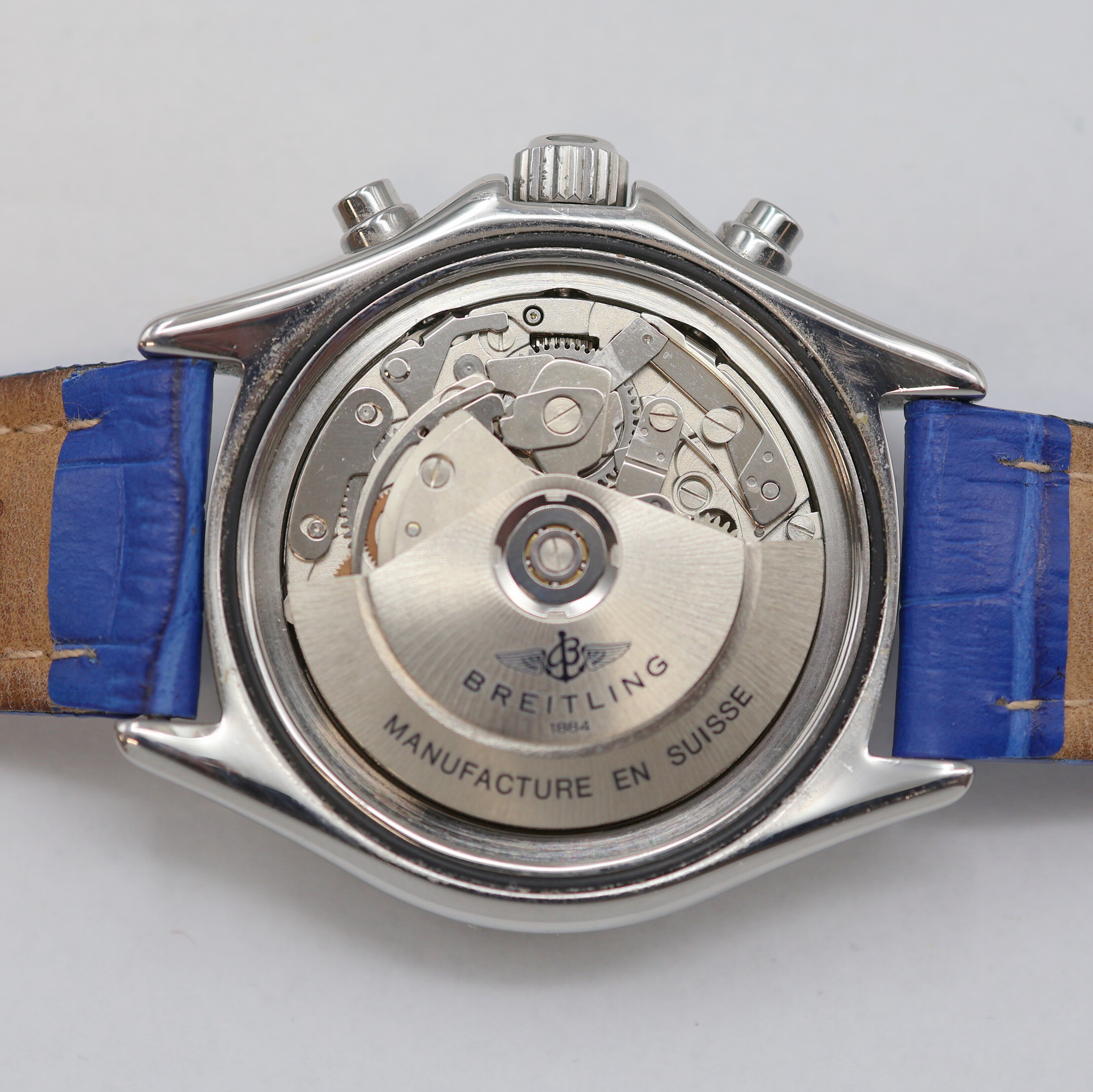 Detail g: BREITLING Armbandchronograph Referenz A13035.1, Schweiz um 1995, Automatik, verschr. Edelstahlgeh., verschr. Krone, eins. drehb. Lünette, blaues ...