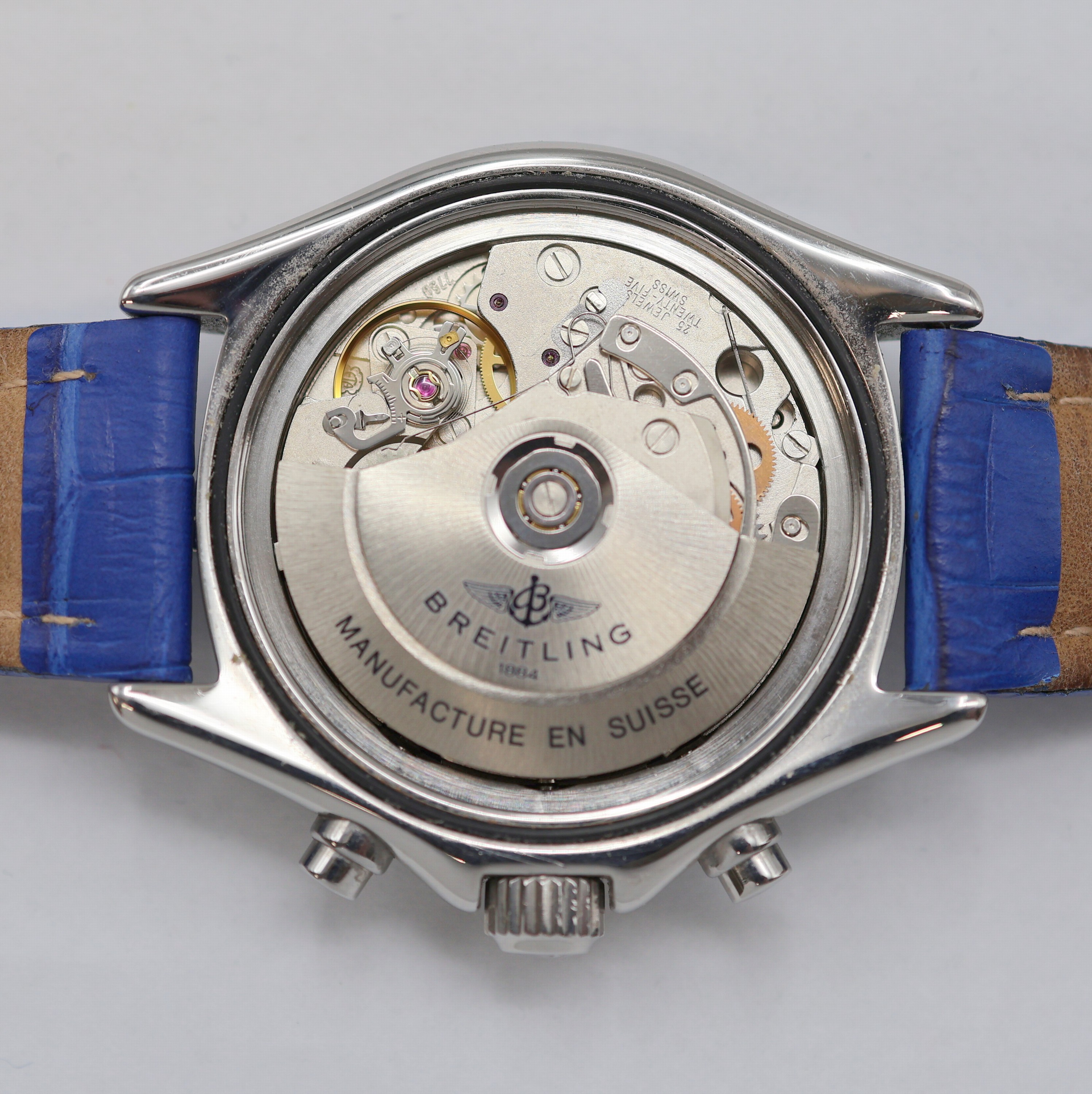 Detail h: BREITLING Armbandchronograph Referenz A13035.1, Schweiz um 1995, Automatik, verschr. Edelstahlgeh., verschr. Krone, eins. drehb. Lünette, blaues ...