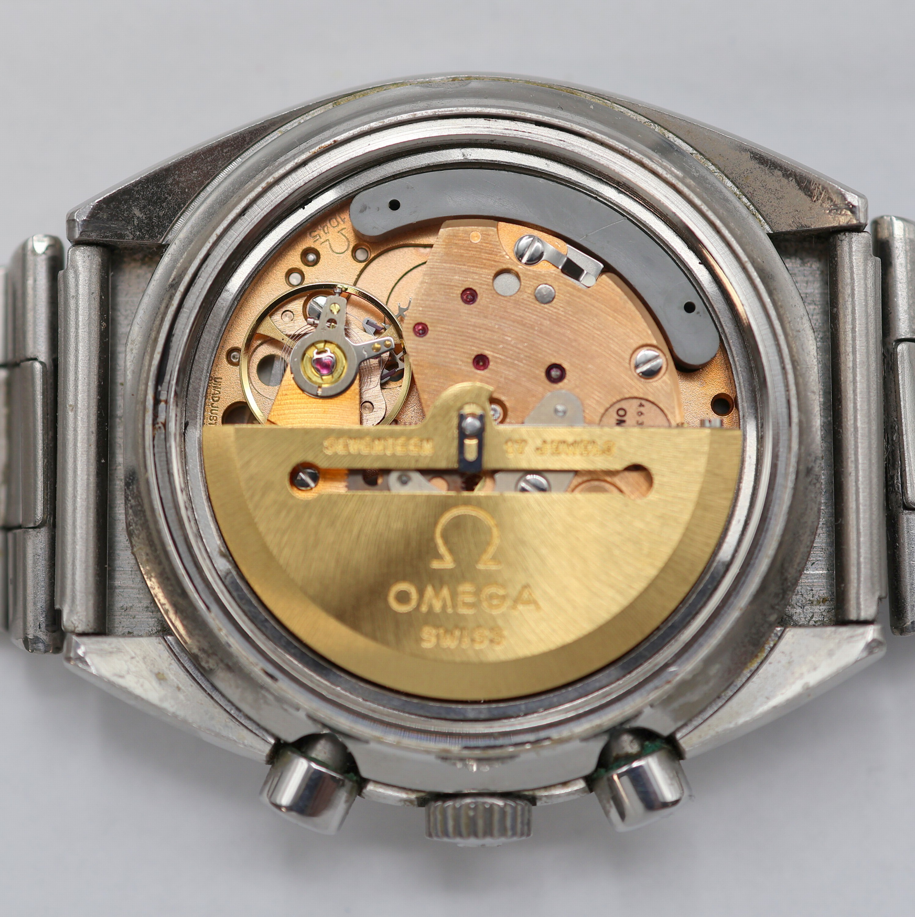 Detail h: OMEGA Speedmaster Armbandchronograph Referenz 176.0012, Schweiz um 1985, Automatik, Edelstahlgeh. inkl. orig. Gliederband m. Faltschließe, Boden m. ...