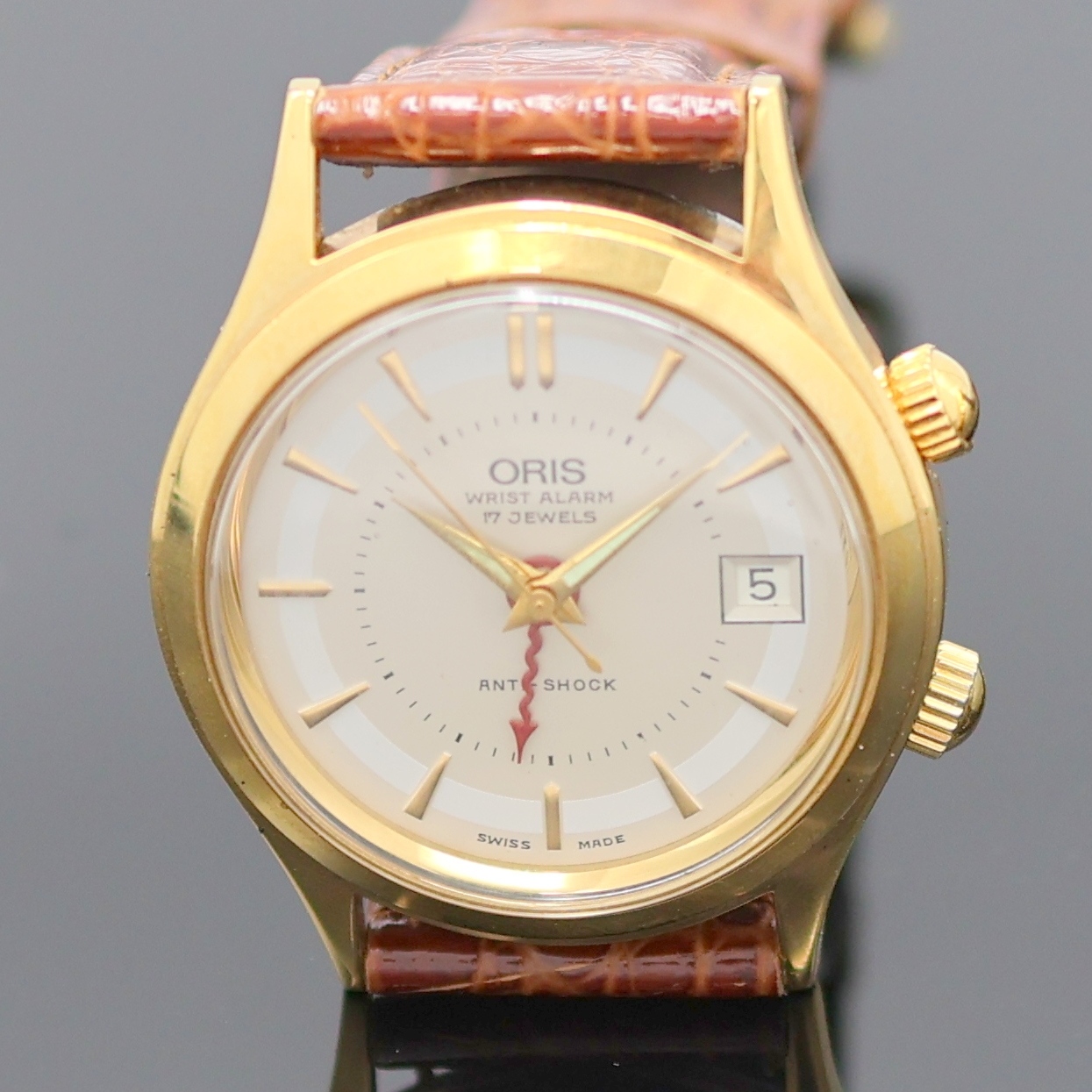 Detail a: ORIS 2 vergoldete Armbanduhren, Schweiz um 1990, Handaufzug, 1) Oris Armbandwecker, Boden verschr., silb. Duoton-Zifferbl. m. gold. Std.-Ind., ...
