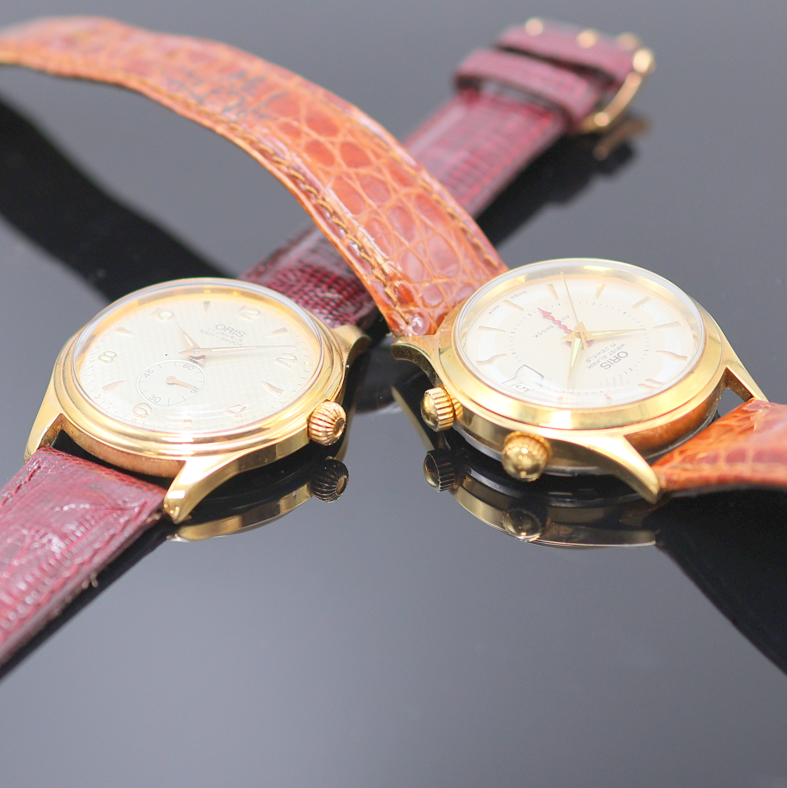 Detail c: ORIS 2 vergoldete Armbanduhren, Schweiz um 1990, Handaufzug, 1) Oris Armbandwecker, Boden verschr., silb. Duoton-Zifferbl. m. gold. Std.-Ind., ...