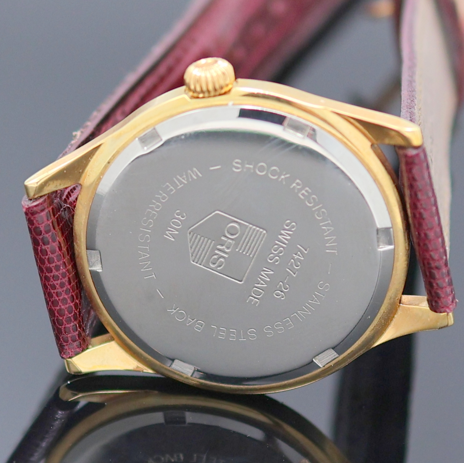 Detail e: ORIS 2 vergoldete Armbanduhren, Schweiz um 1990, Handaufzug, 1) Oris Armbandwecker, Boden verschr., silb. Duoton-Zifferbl. m. gold. Std.-Ind., ...