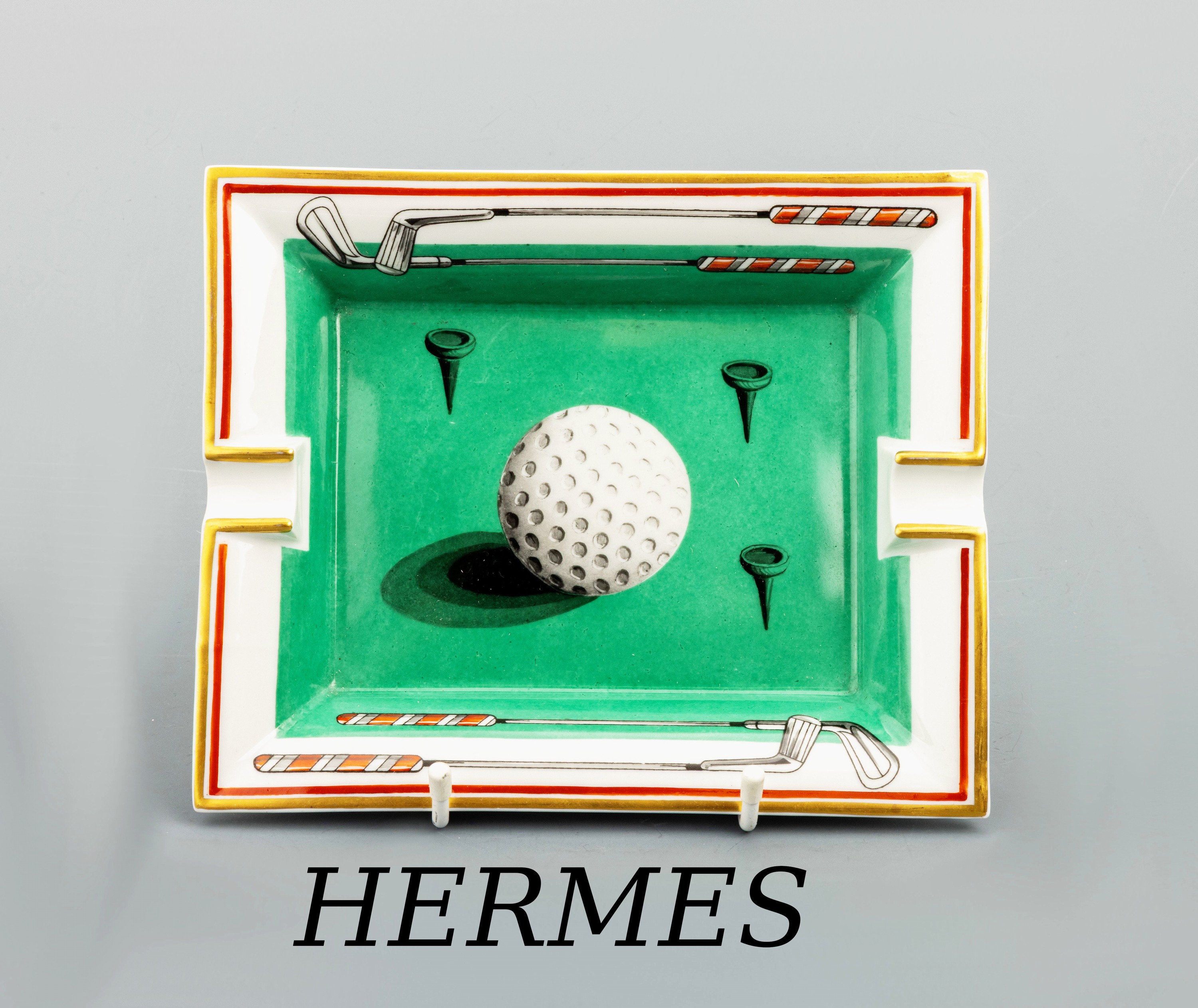 Image 26975435 - HERMES Aschenbecher, ´Golfball´, weißes Porzellan, goldfarb./roter Rand, grüner ...