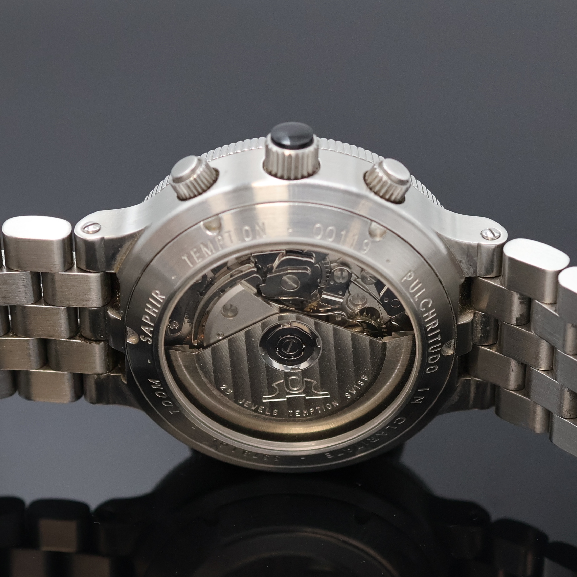 Detail d: TEMPTION Herrenchronograph in Stahl, Schweiz um 2010, Automatik, beids. vergl. Geh., Boden, Krone u. Drücker verschr., eins. drehb. Stahl-Lünette ...