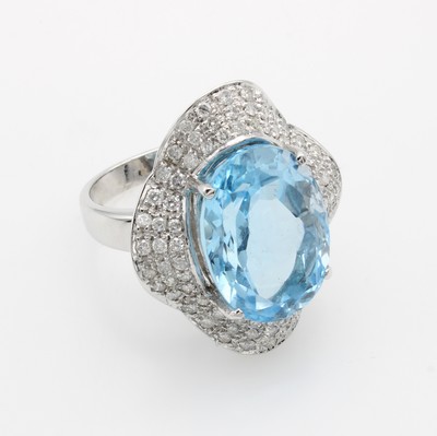 26975561a - Ring mit Topas und Brillanten, WG 750/000, ovaler, fac. Blautopas (beh.) ca. 19 ct ...