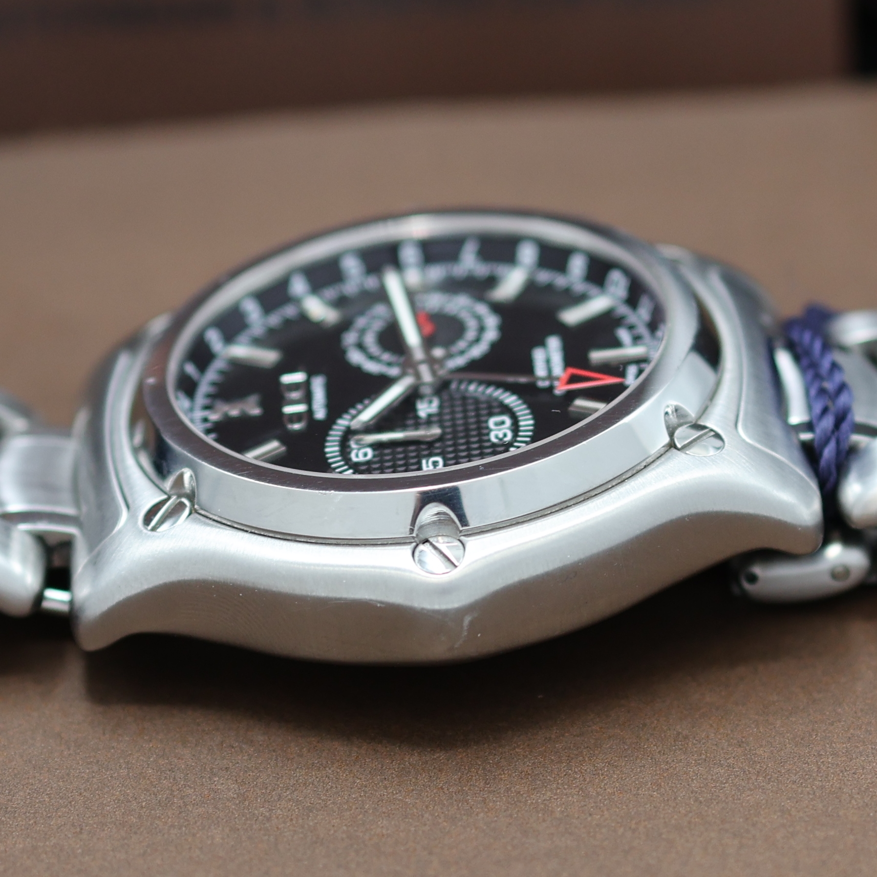 Detail e: EBEL 1911 BTR GMT Armbandchronograph Chronometer Referenz 9240L70, Schweiz verk. lt. Pap. 11/2014, Automatik, Edelstahlgeh. beids. vergl., Boden ...