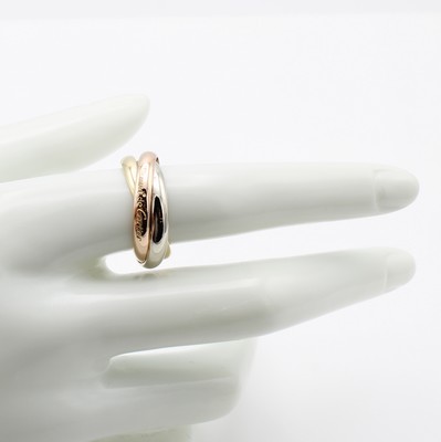 26975959a - Cartier Ring Trinity, GG/WG/RG 750/000, sign. u. nummeriert, B. ca. 3.3 mm, RW ca. 57, ...