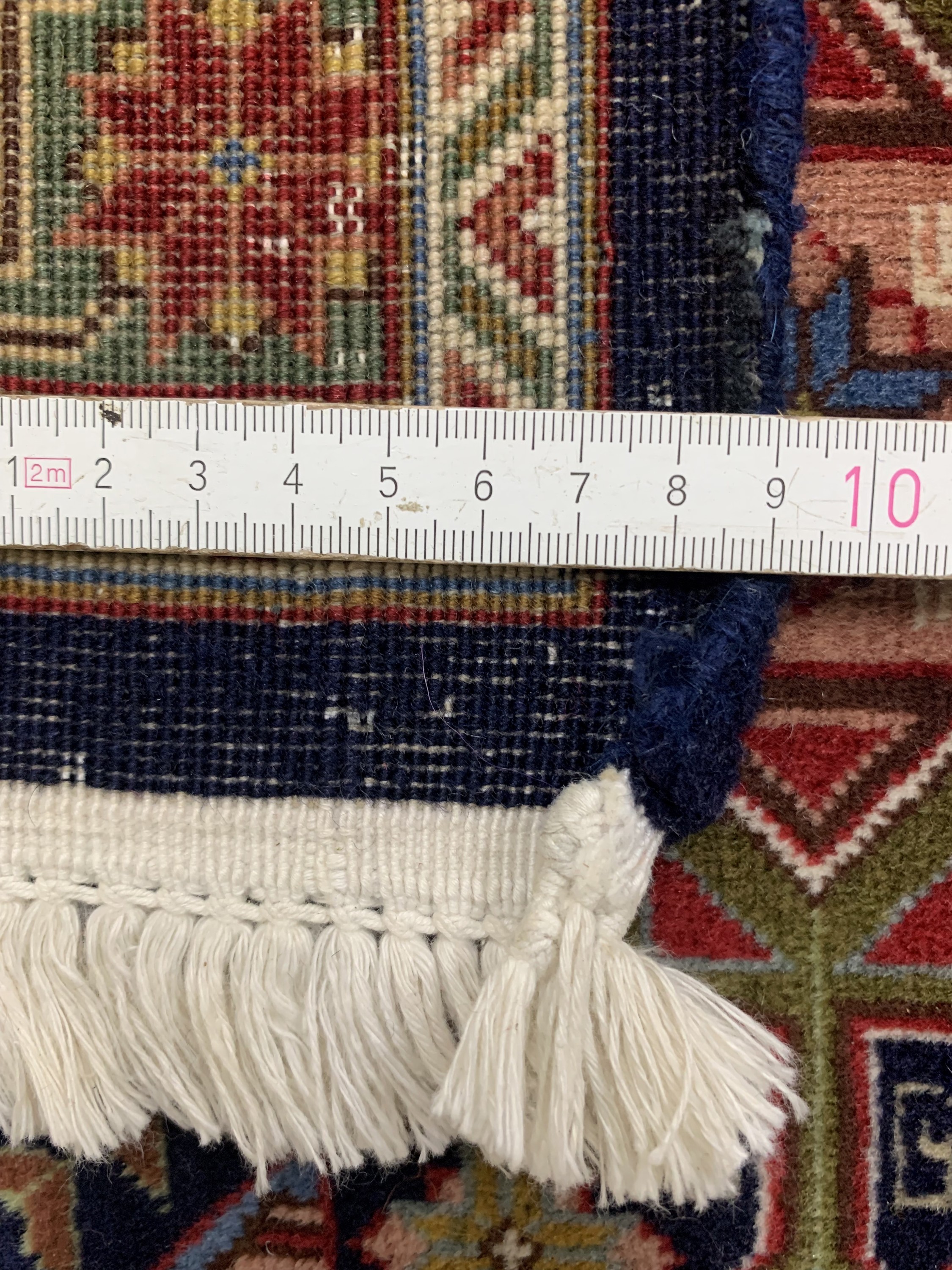Detail i: Täbriz fein(50 Raj), Persien, Mitte 20.Jhd,Korkwolle auf Baumwolle, ca. 323 x 250 cm, ca.500.000 Kn/qm, gereinigt, EHZ: 2(Mottenfraß)