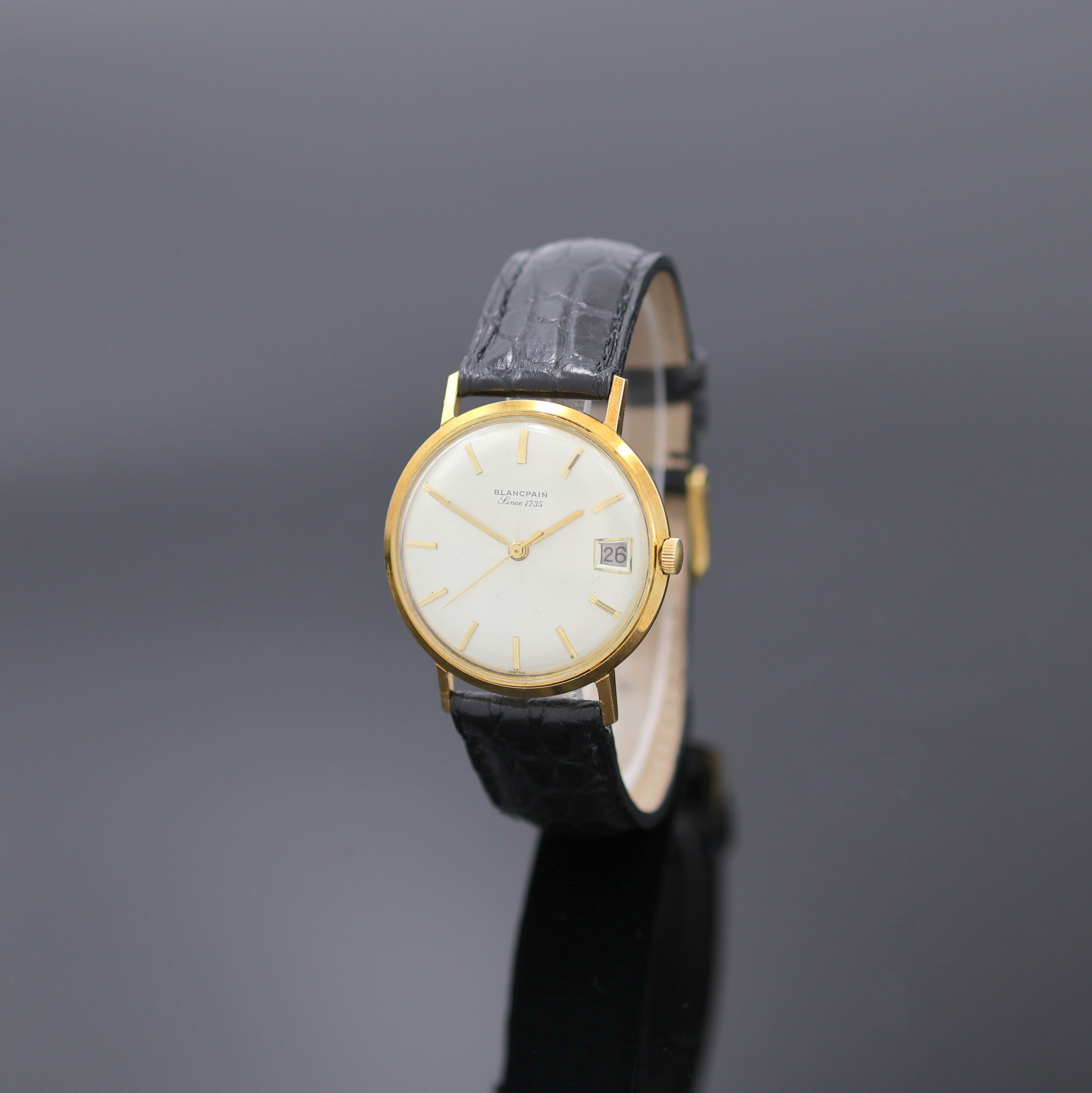 BLANCPAIN Armbanduhr in GG 750/000, Schweiz um 1970, Automatik, Monocoque-Geh., silb. Zifferbl. m. aufges. gold. Std.-Ind., gold. Zeiger, Datum b. 3, ...