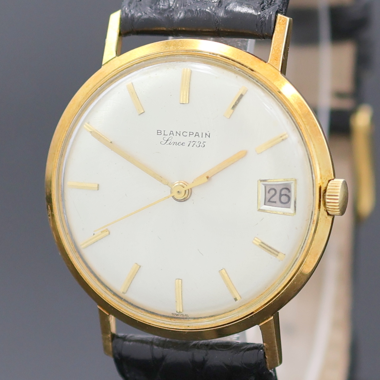 Detail a: BLANCPAIN Armbanduhr in GG 750/000, Schweiz um 1970, Automatik, Monocoque-Geh., silb. Zifferbl. m. aufges. gold. Std.-Ind., gold. Zeiger, Datum b. 3, ...